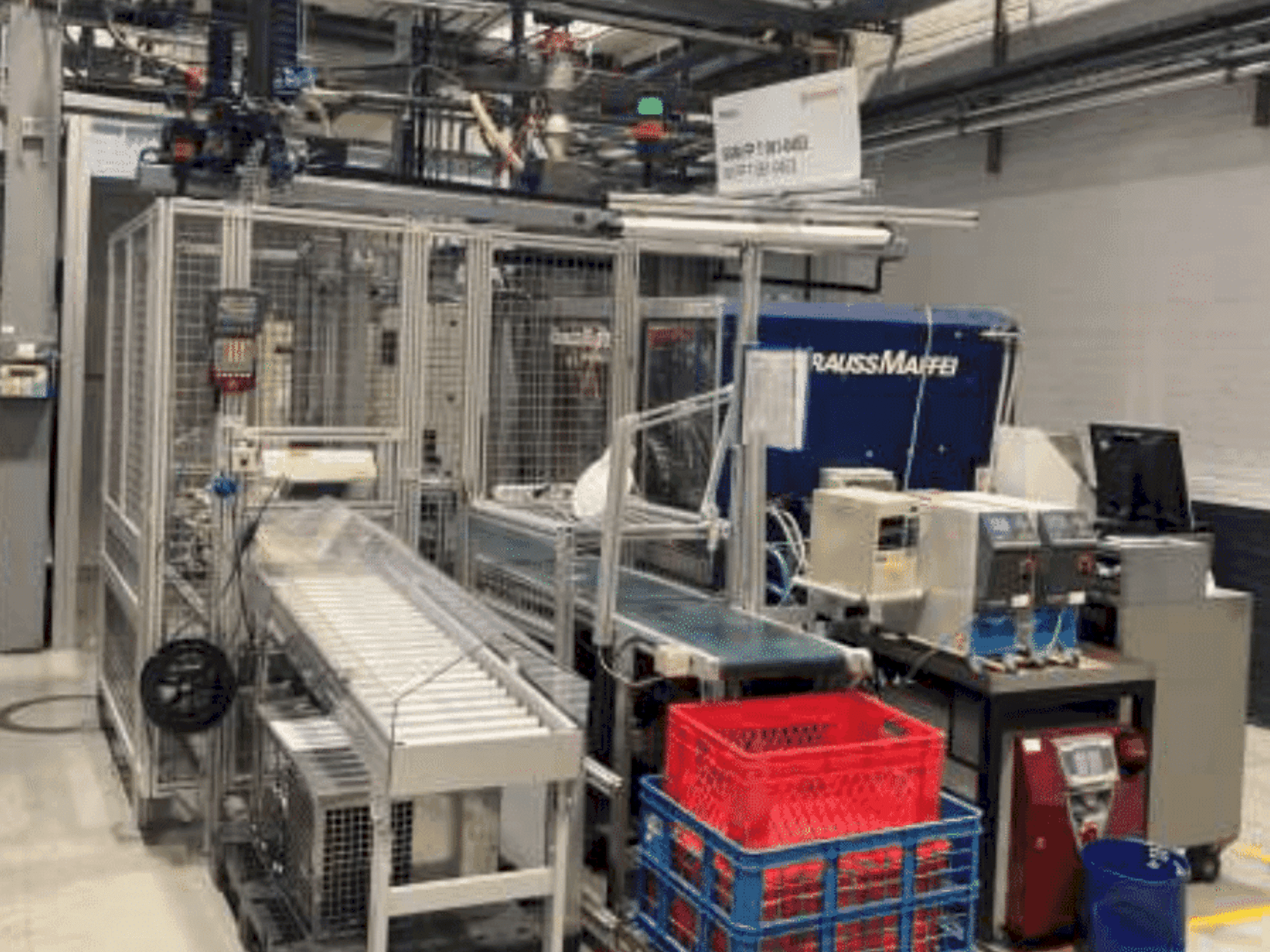 Vue de face de la machine Krauss Maffei KM 125-390 C2