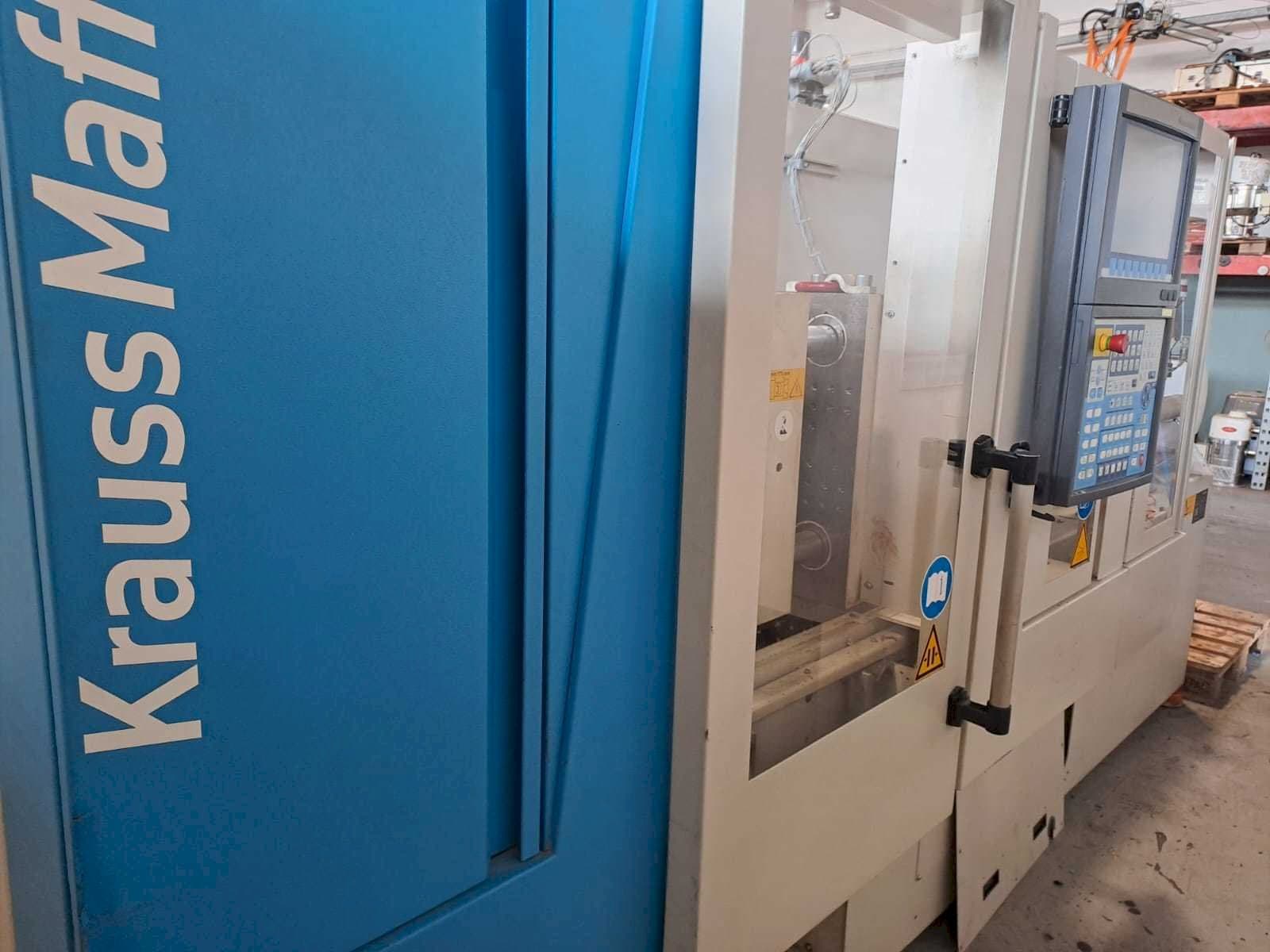 Vue de face de la machine Krauss Maffei 35-180CX