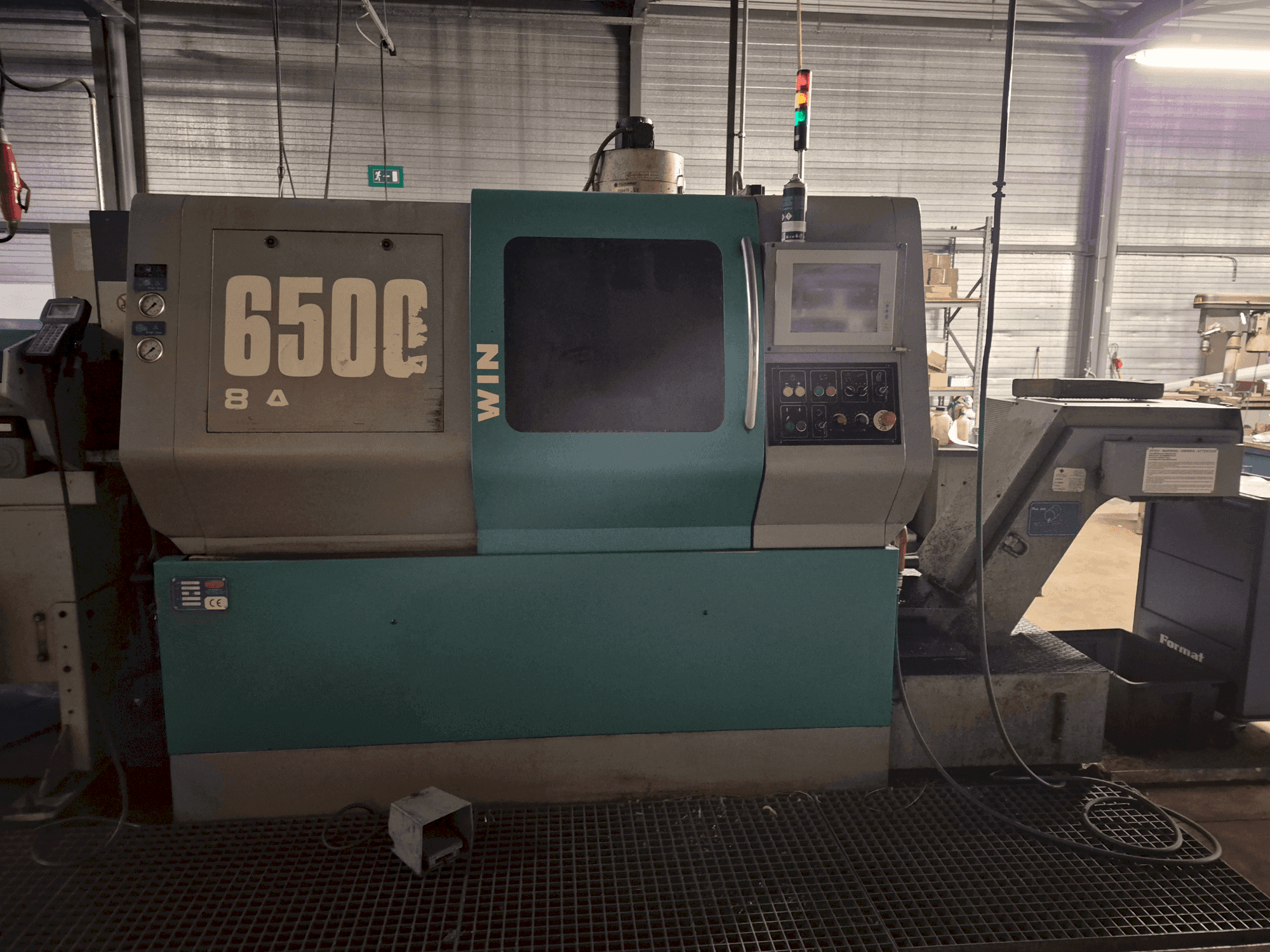 Vue de face de la machine MUPEM WIN 6500