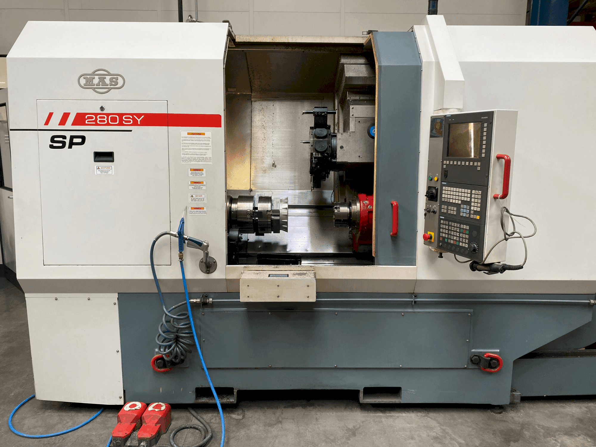 Vue de face de la machine MAS SP280 SY