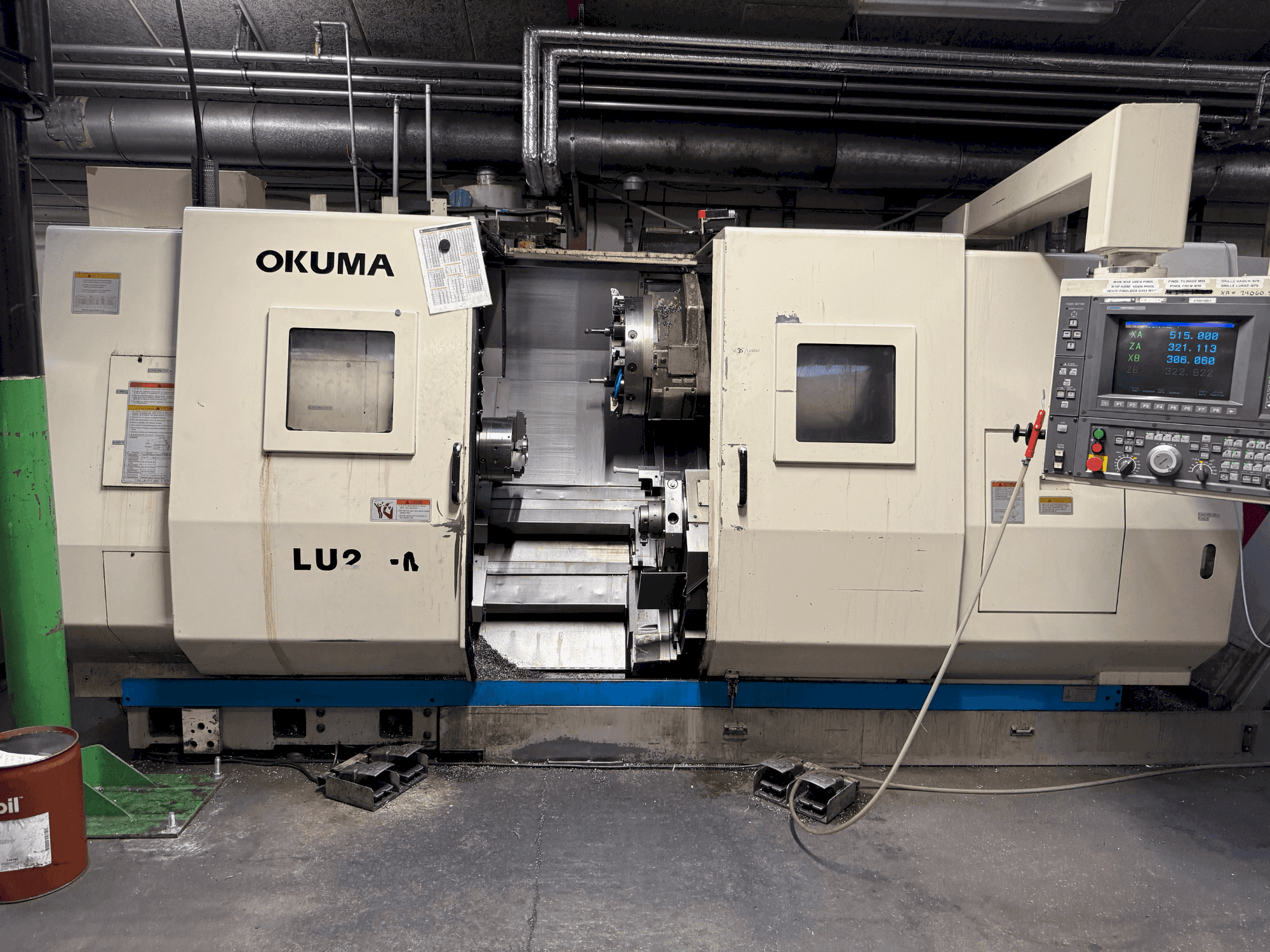 Vue de face de la machine Okuma LU2-M