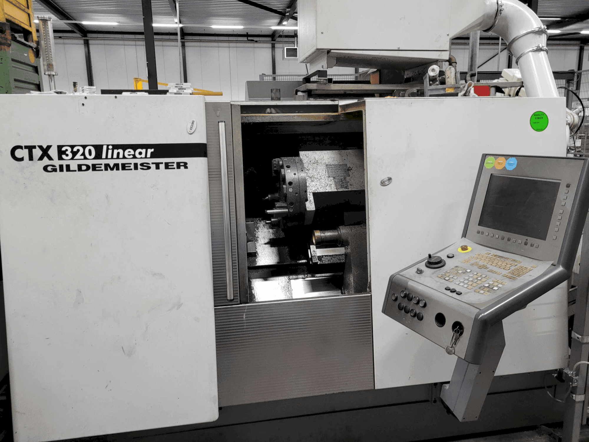Vue de face de la machine DMG Gildemeister CTX 320 linear
