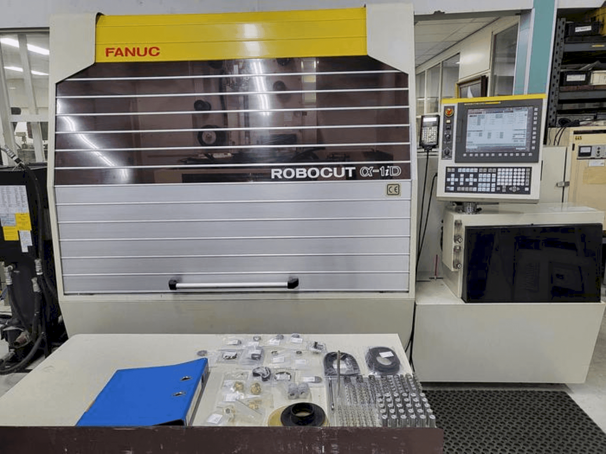 Vue de face de la machine FANUC Alpha 1ID