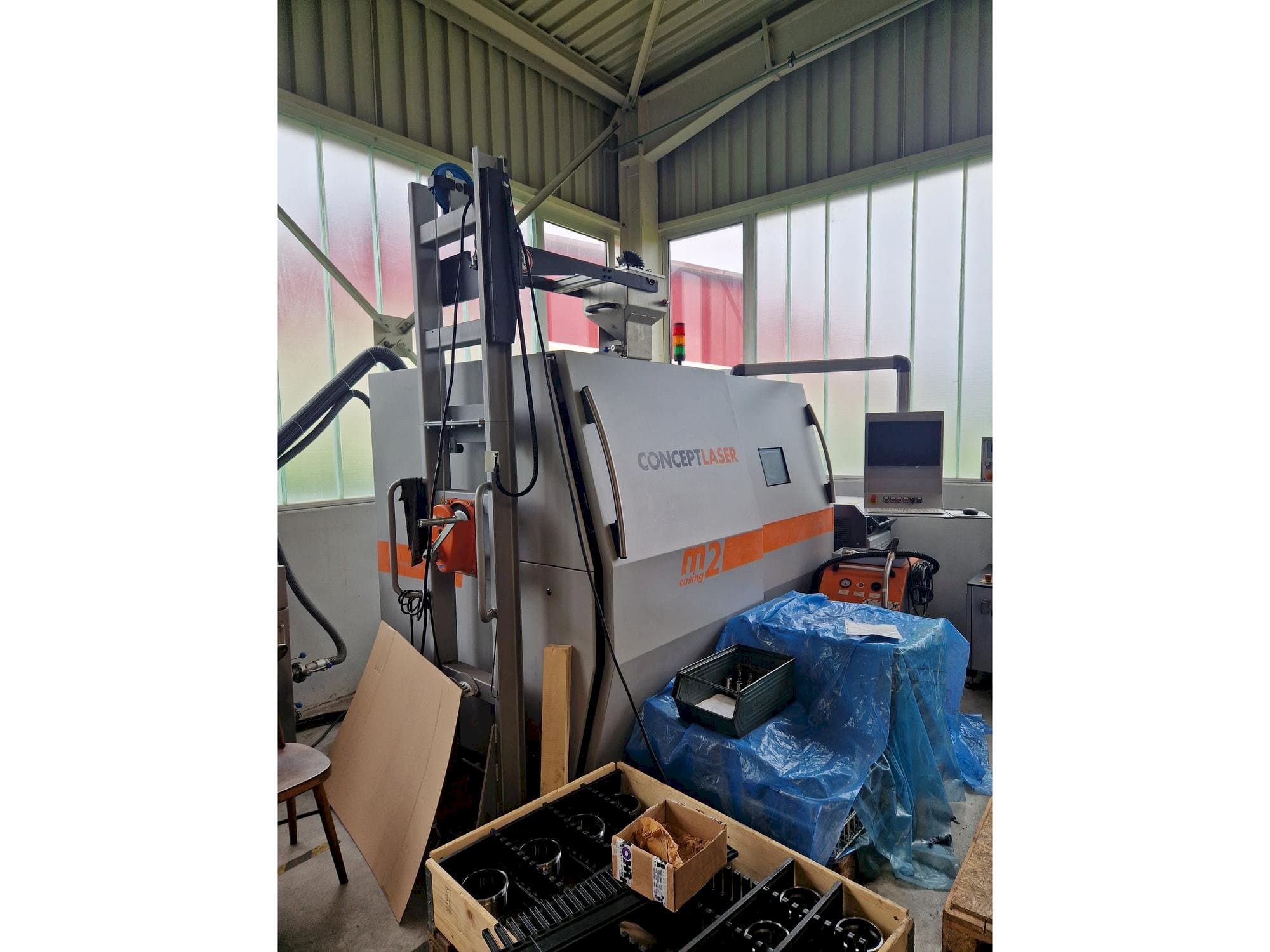 Vue de face de la machine CONCEPT LASER M2 cusing