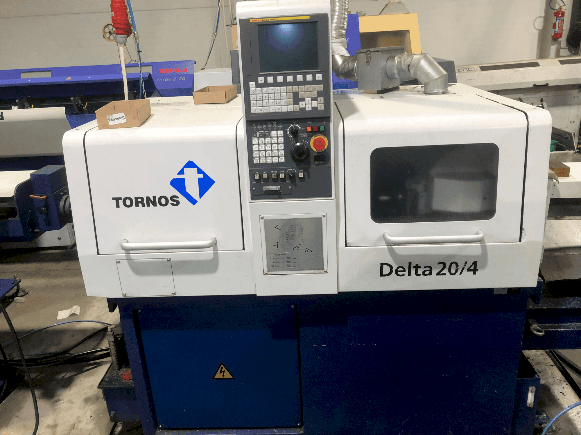 Vue de face de la machine TORNOS TORNOS DELTA 20/4