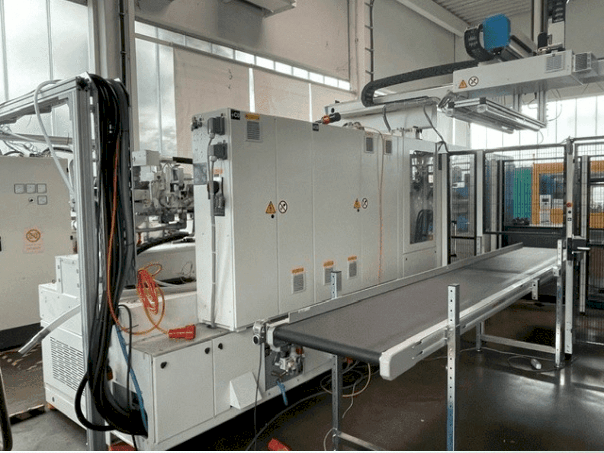 Vue de face de la machine Krauss Maffei 300-1400 CX MC6