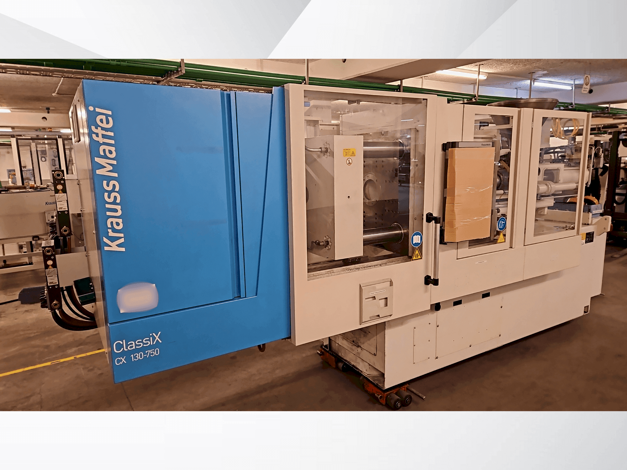 Vue de face de la machine Krauss Maffei 130-750 CX