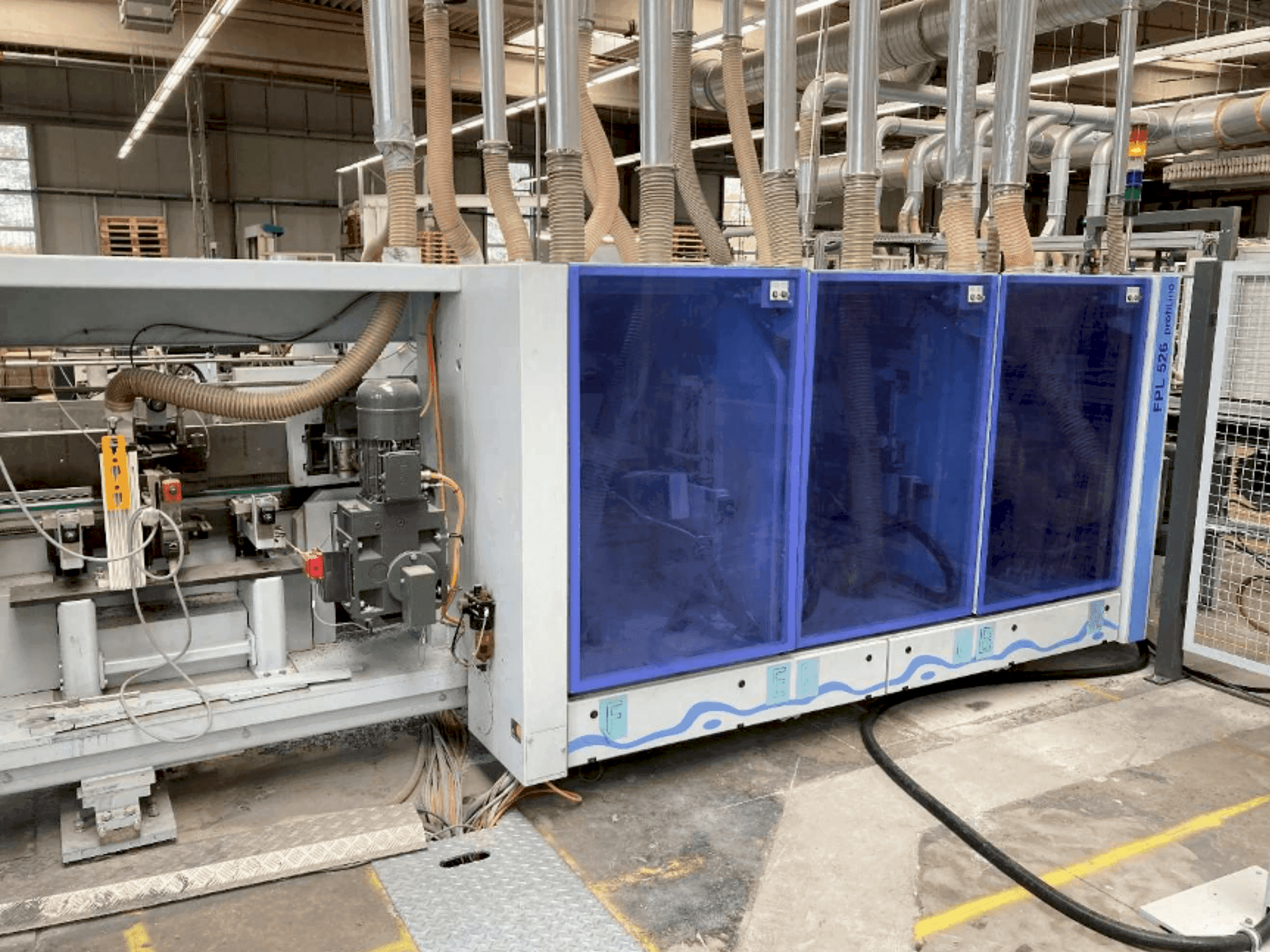 Vue de face de la machine HOMAG PROFI FPL 525/6/04/PW/V LVT Profiling System