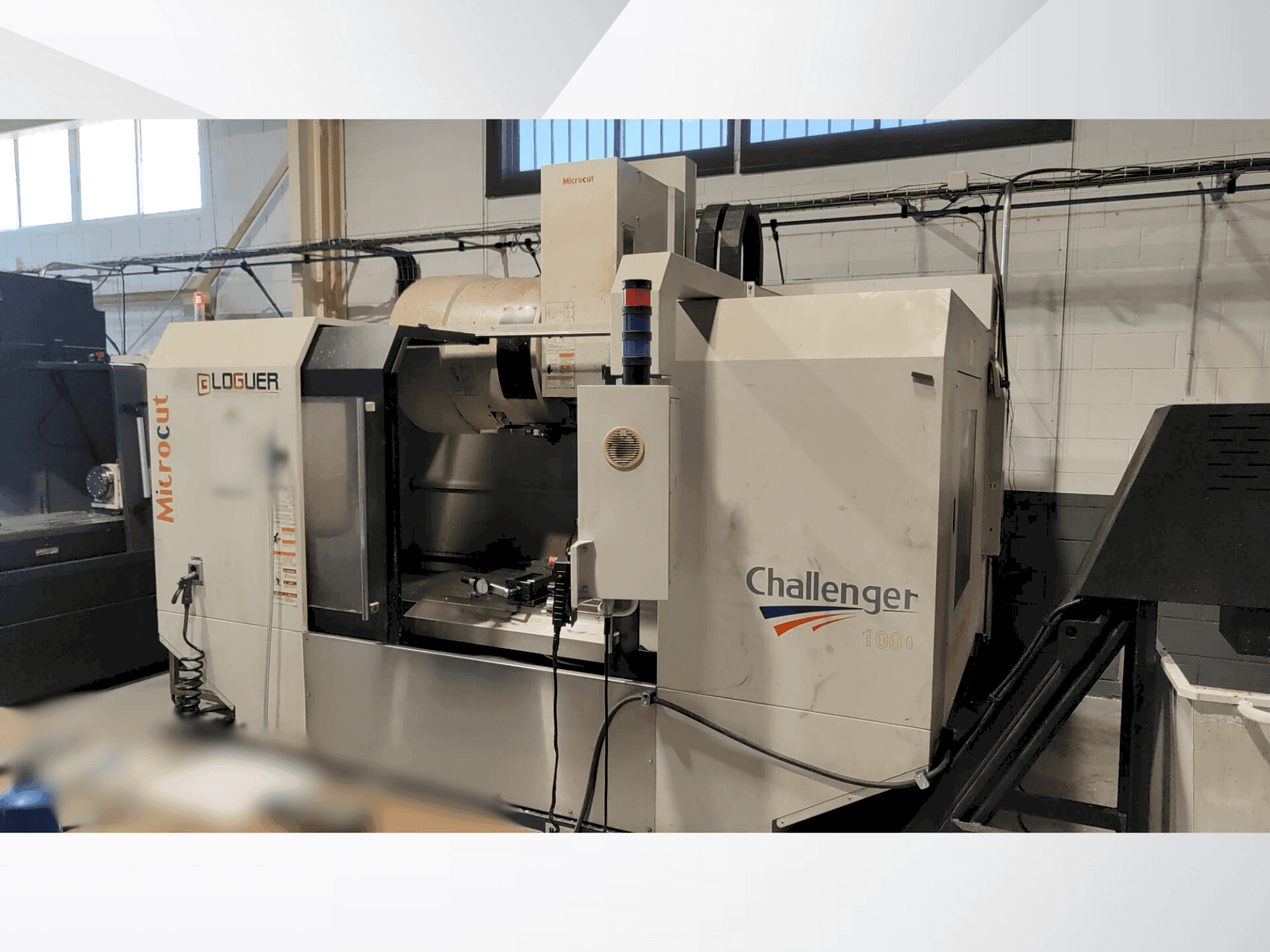 Vue de face de la machine MICROCUT Challenger VM 1000