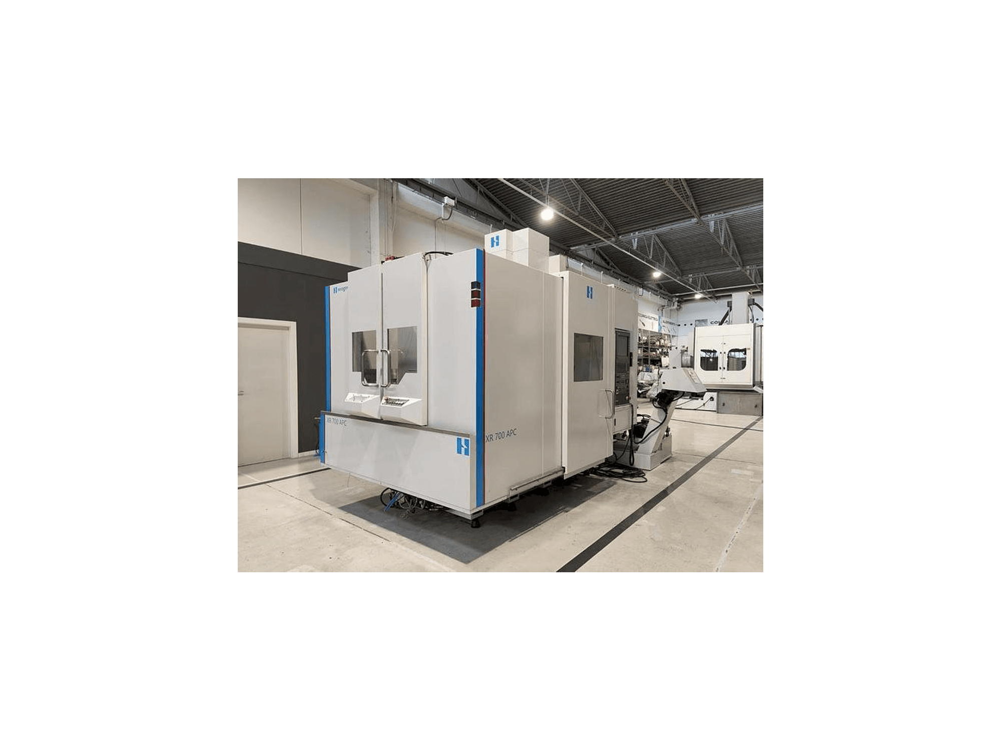 Front view of Bridgeport XR-700 APC machine