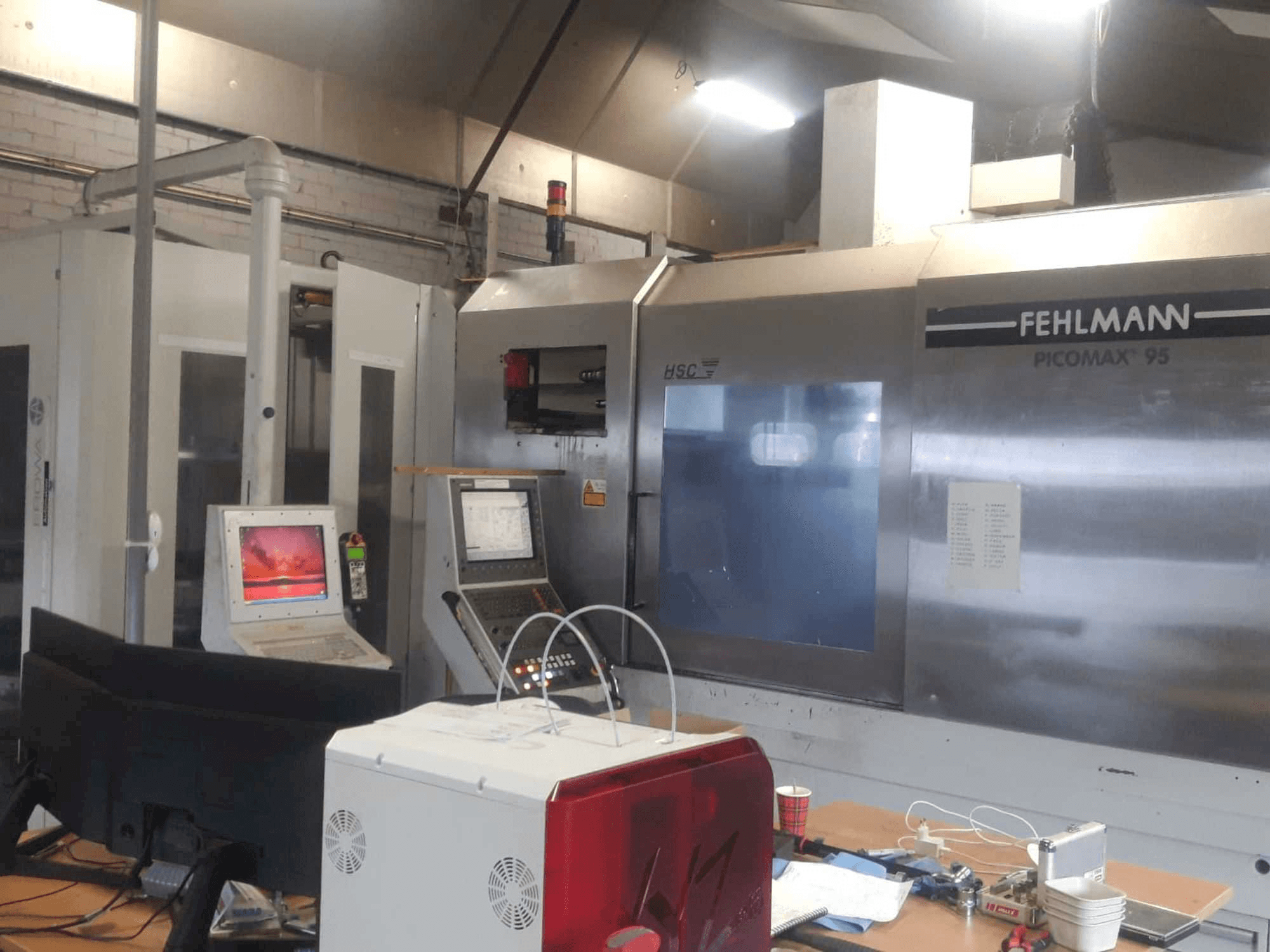 Vue de face de la machine FEHLMANN PICOMAX 95 + EROWA