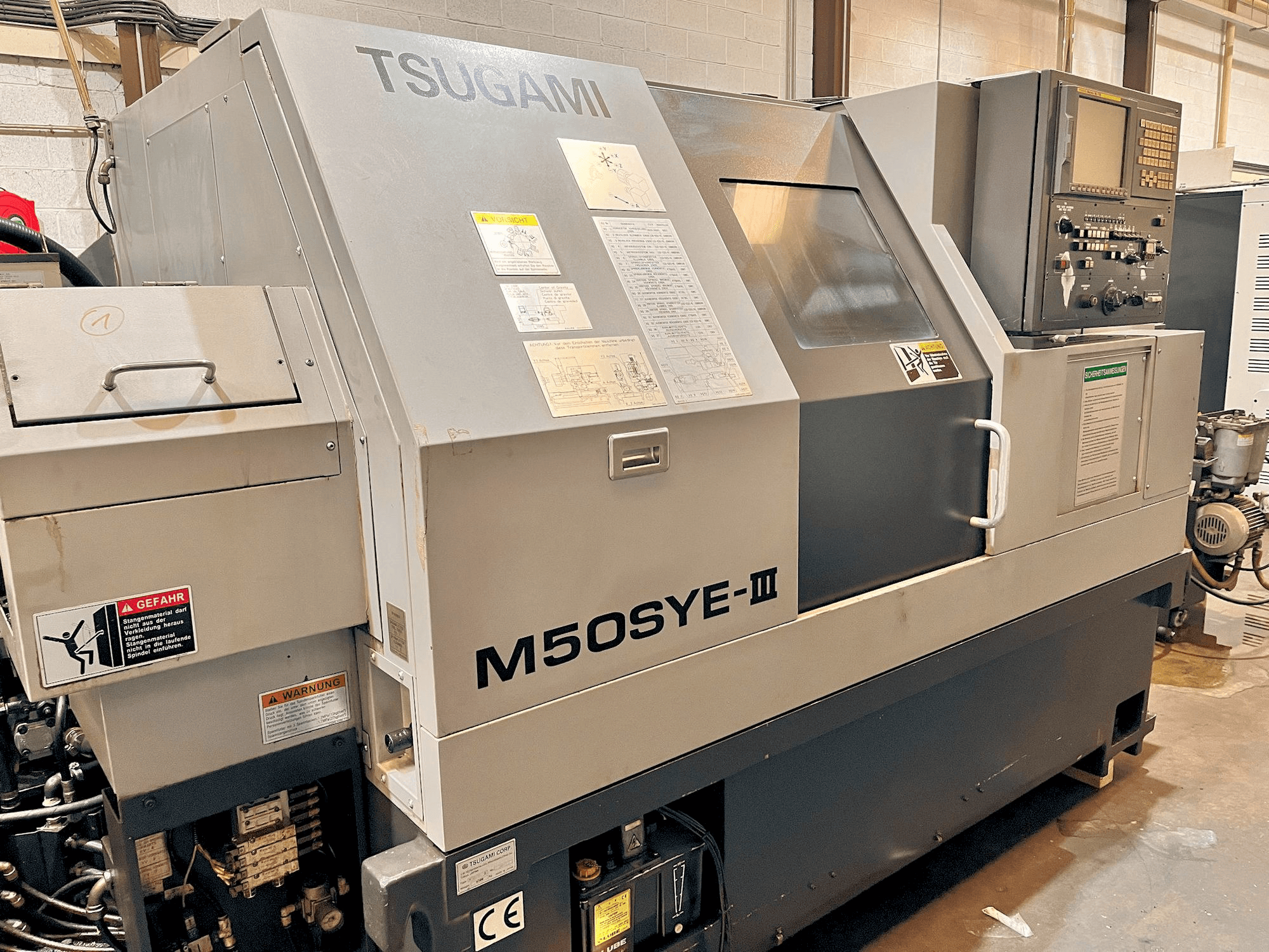 Front view of TSUGAMI M50SYE-III machine