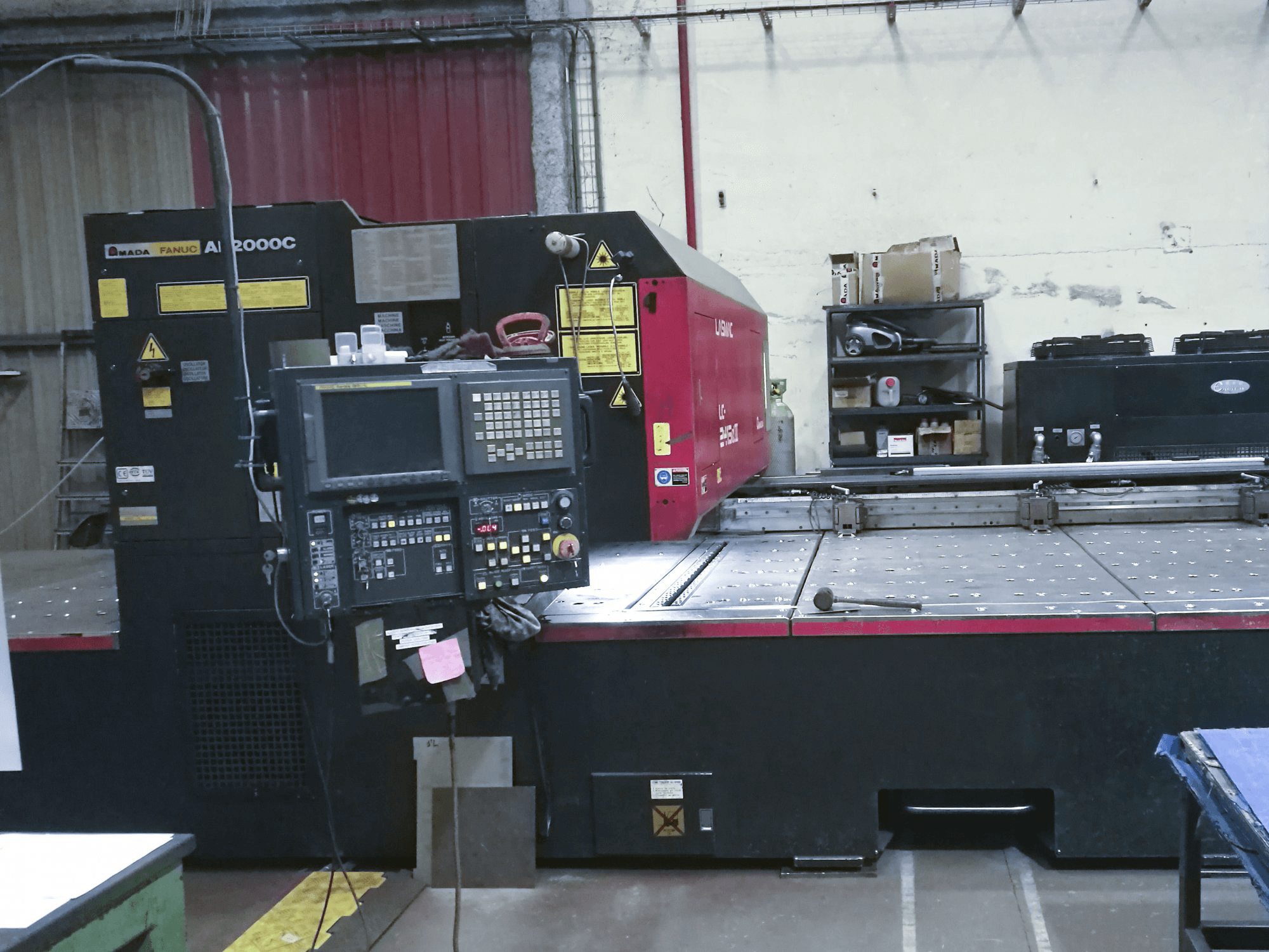 Front view of AMADA LC 2415 α3 Machine