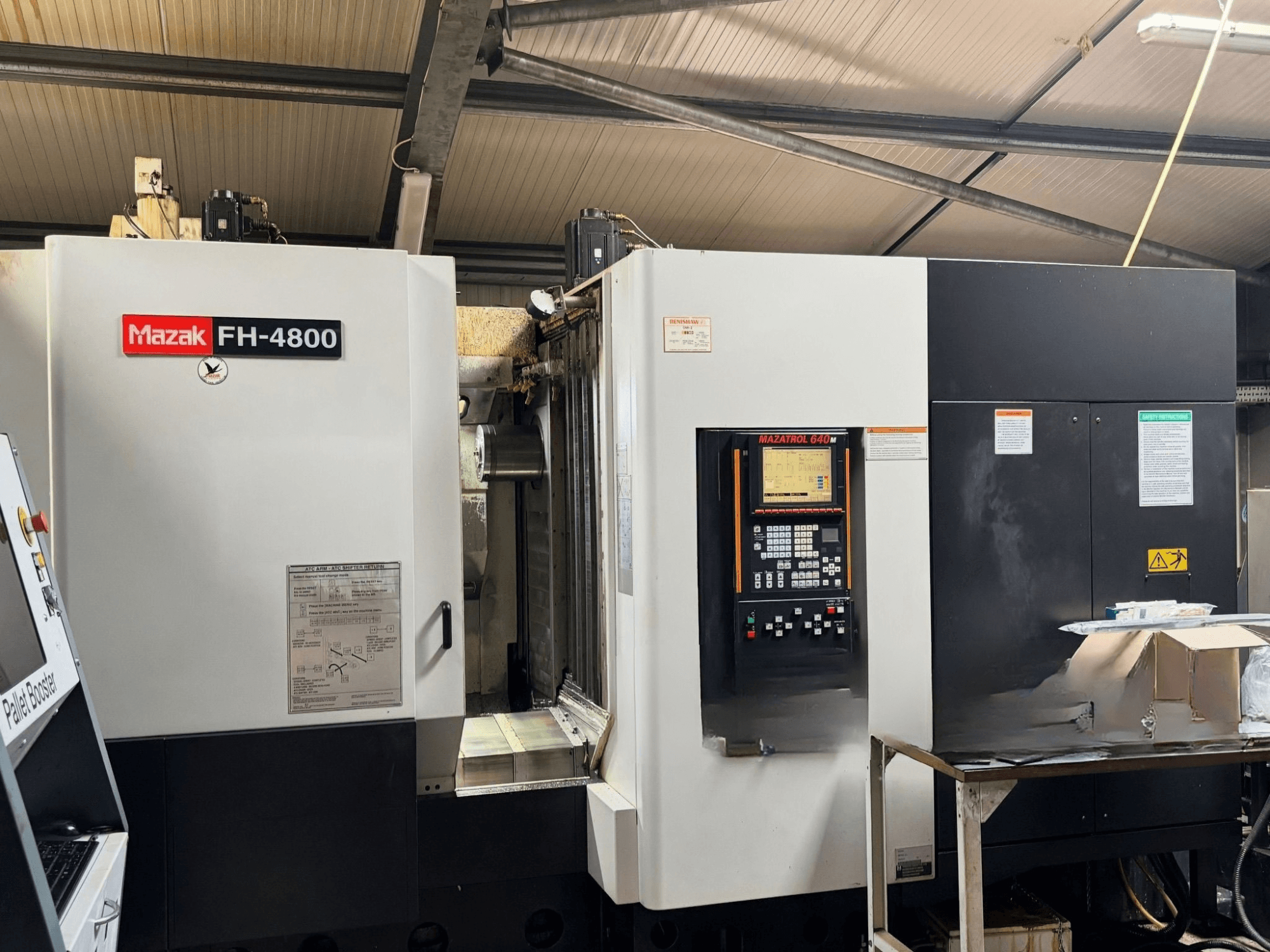 Centre d'usinage horizontal Mazak FH-4800, vue de face montrant le panneau de commande et les détails de la machine.