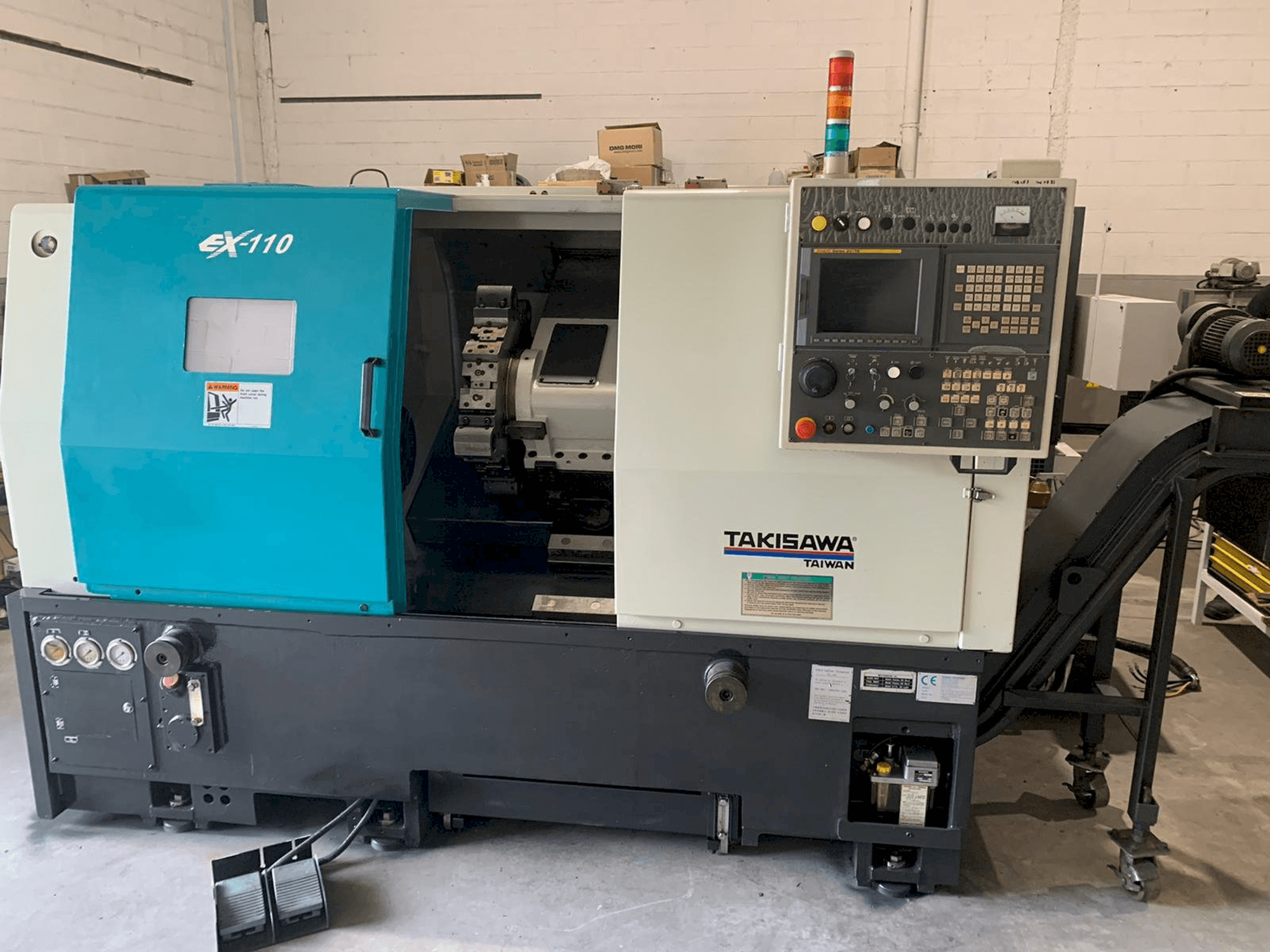 Vue de face de la machine Takisawa EX-110