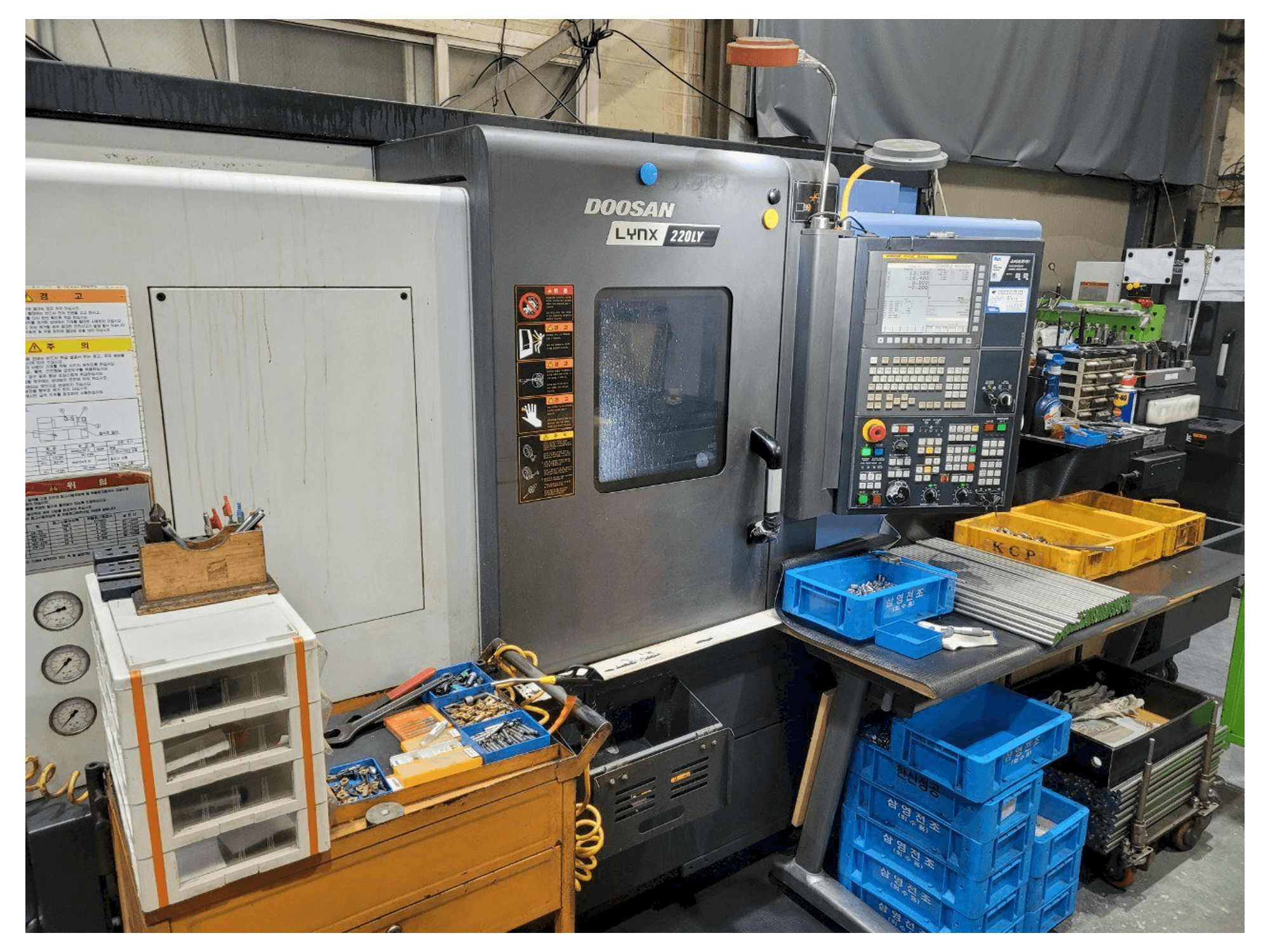 Front view of Doosan LYNX220LYA machine