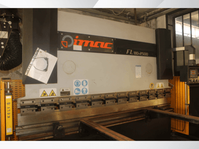 Cintreuse IMAC FL 80-2500, vue de face, avec panneau de commande, avertissements de sécurité et composants de l'outillage métallique.
