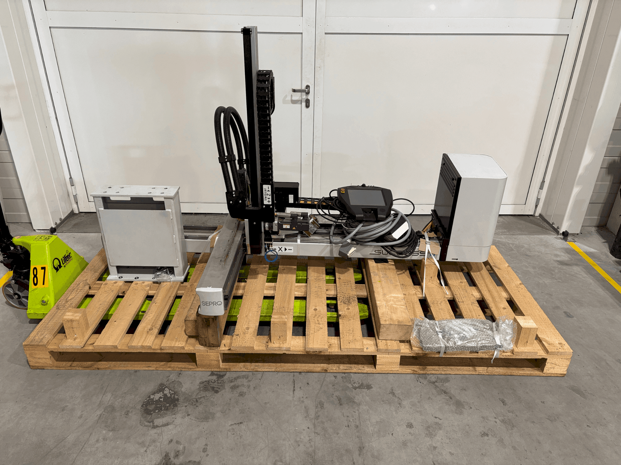 Vue de face de la machine Sepro Success 11