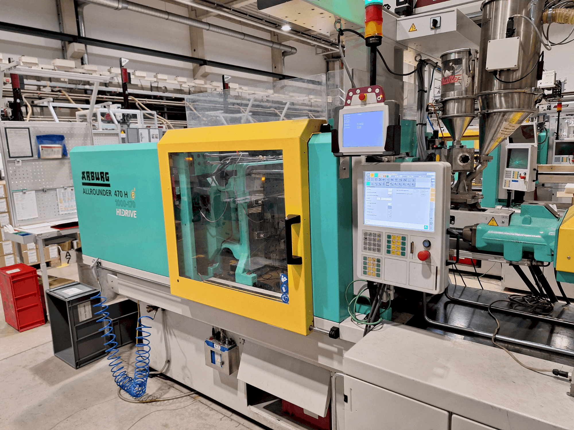 Vue de face de la machine Arburg 470 H 1000-170