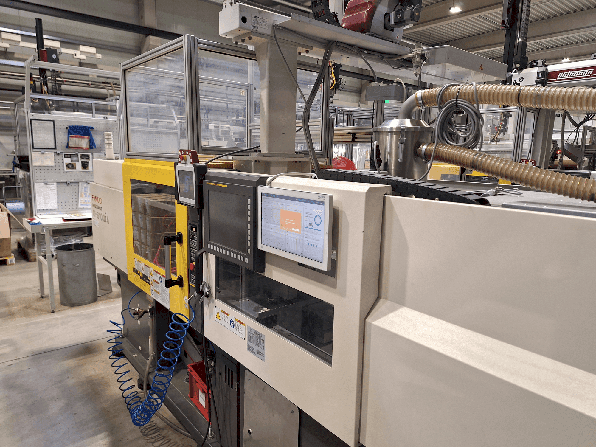 Vue de face de la machine FANUC Roboshot S100iA