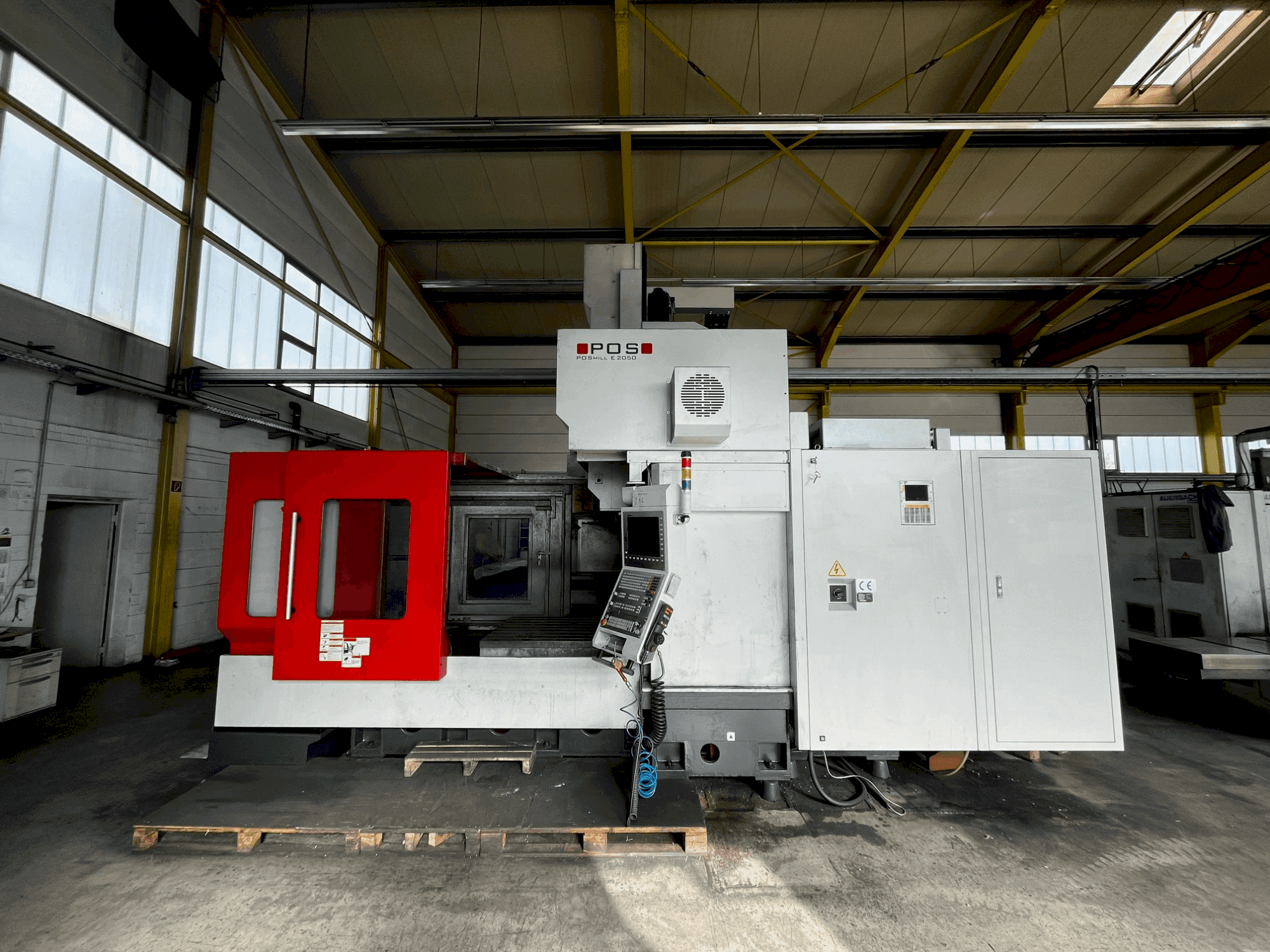 Vue de face de la machine POSmill E 2050