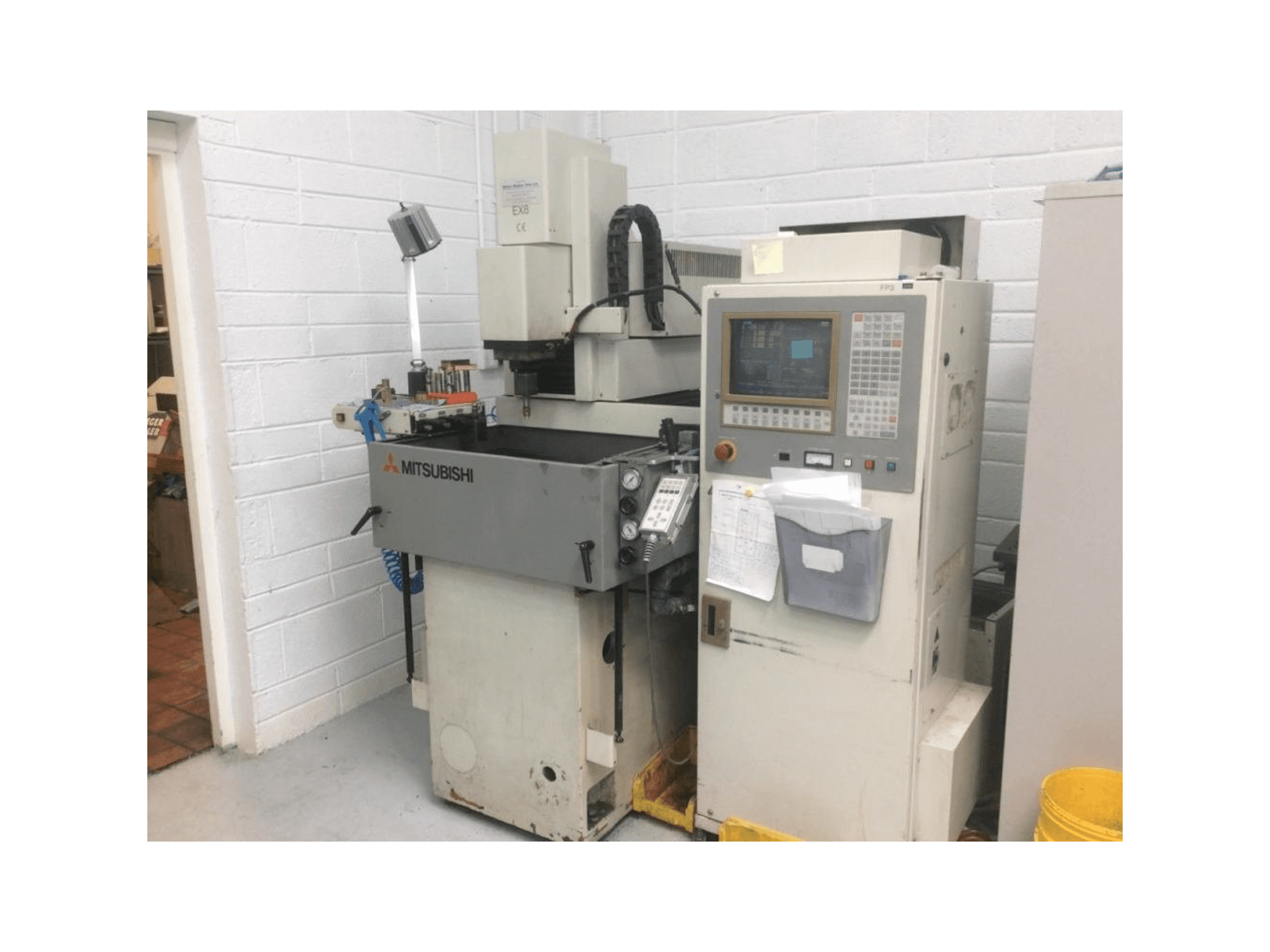 Front view of Mitsubishi EX 8 machine