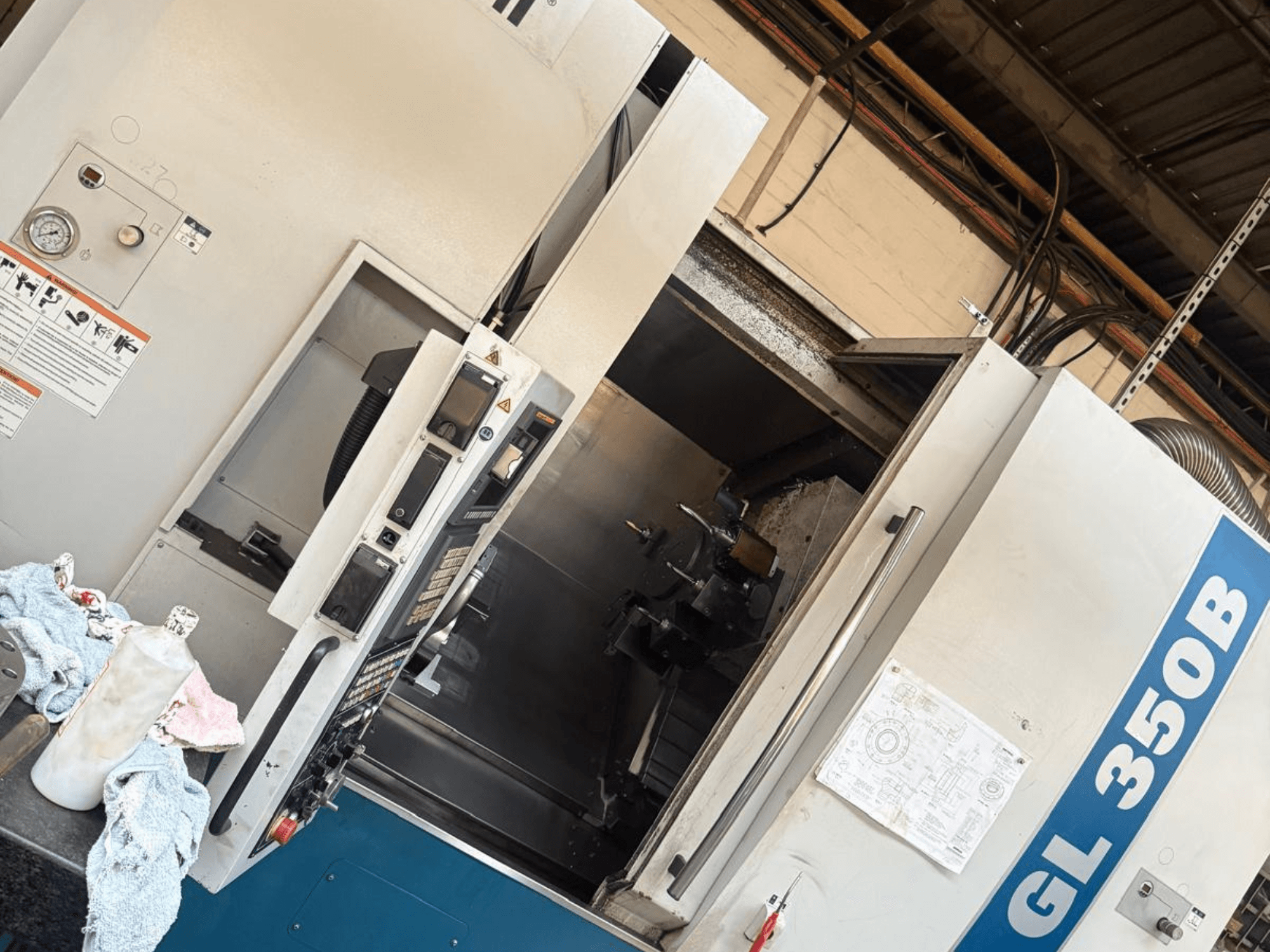 Tour horizontal Romi GL 350B, vue de face, avec panneau de commande et porte ouverte révélant l'intérieur.