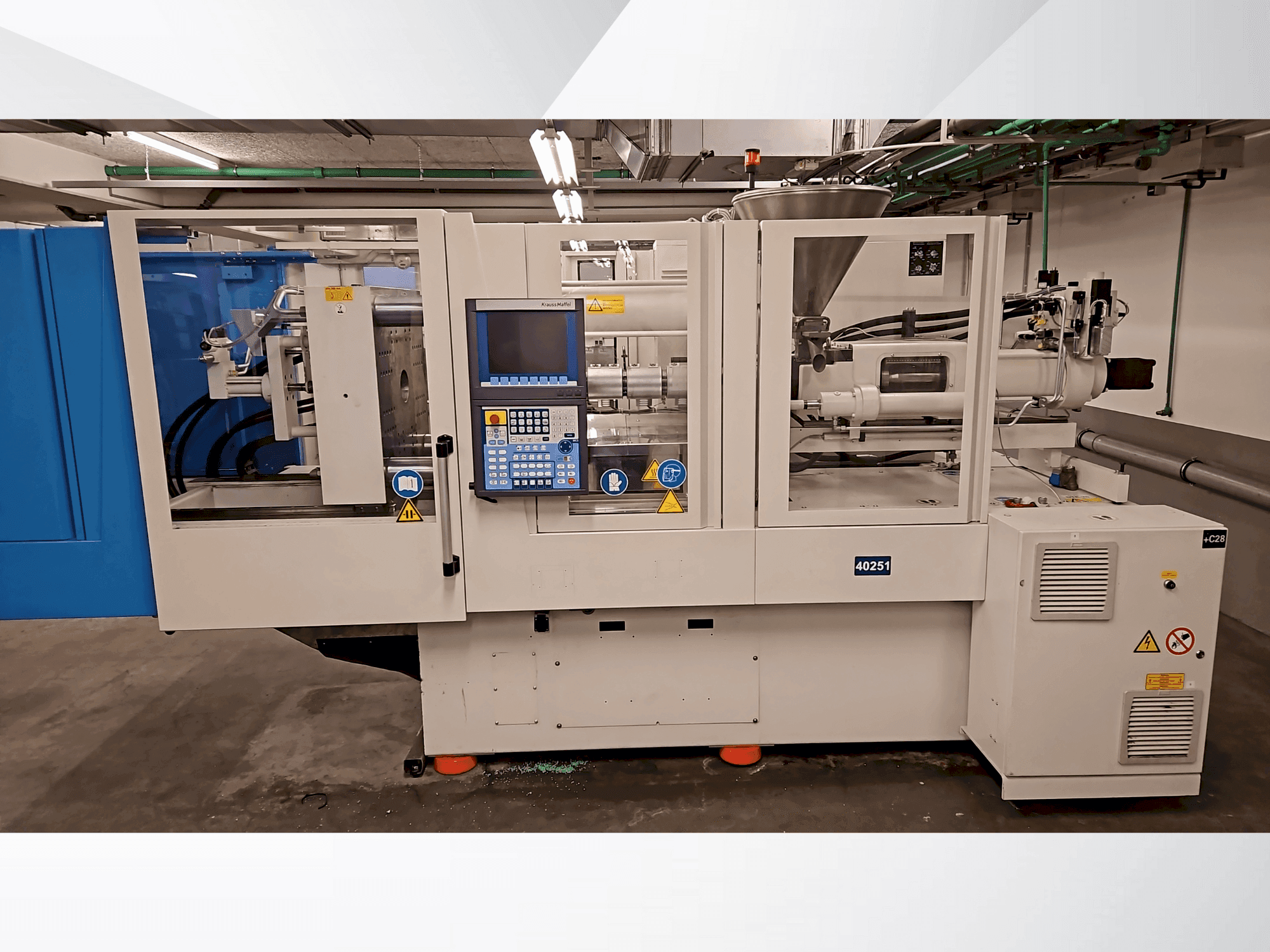 Vue de face de la machine Krauss Maffei 110-750 CX