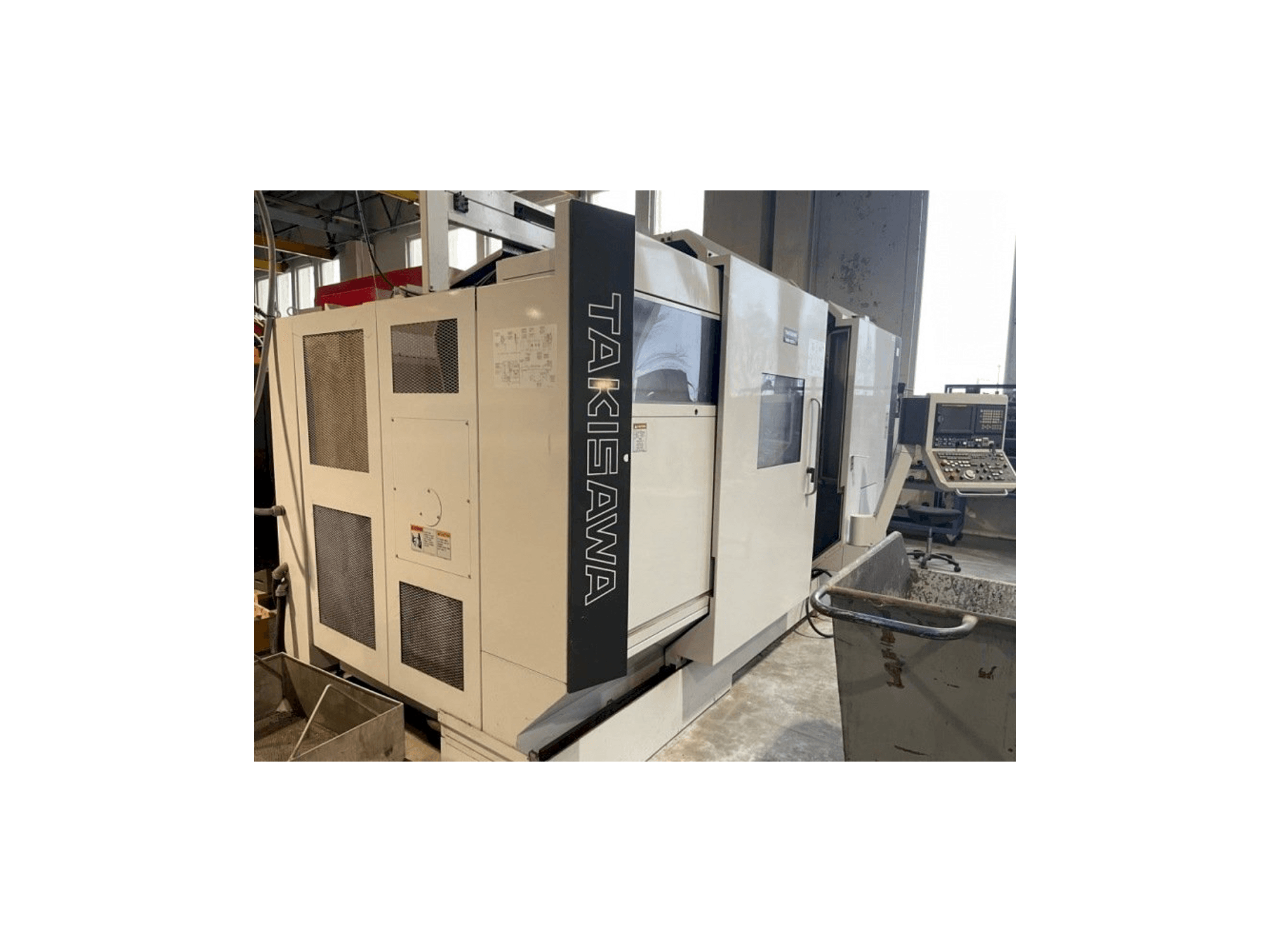 Vue de face de la machine Takisawa TMM250-M3