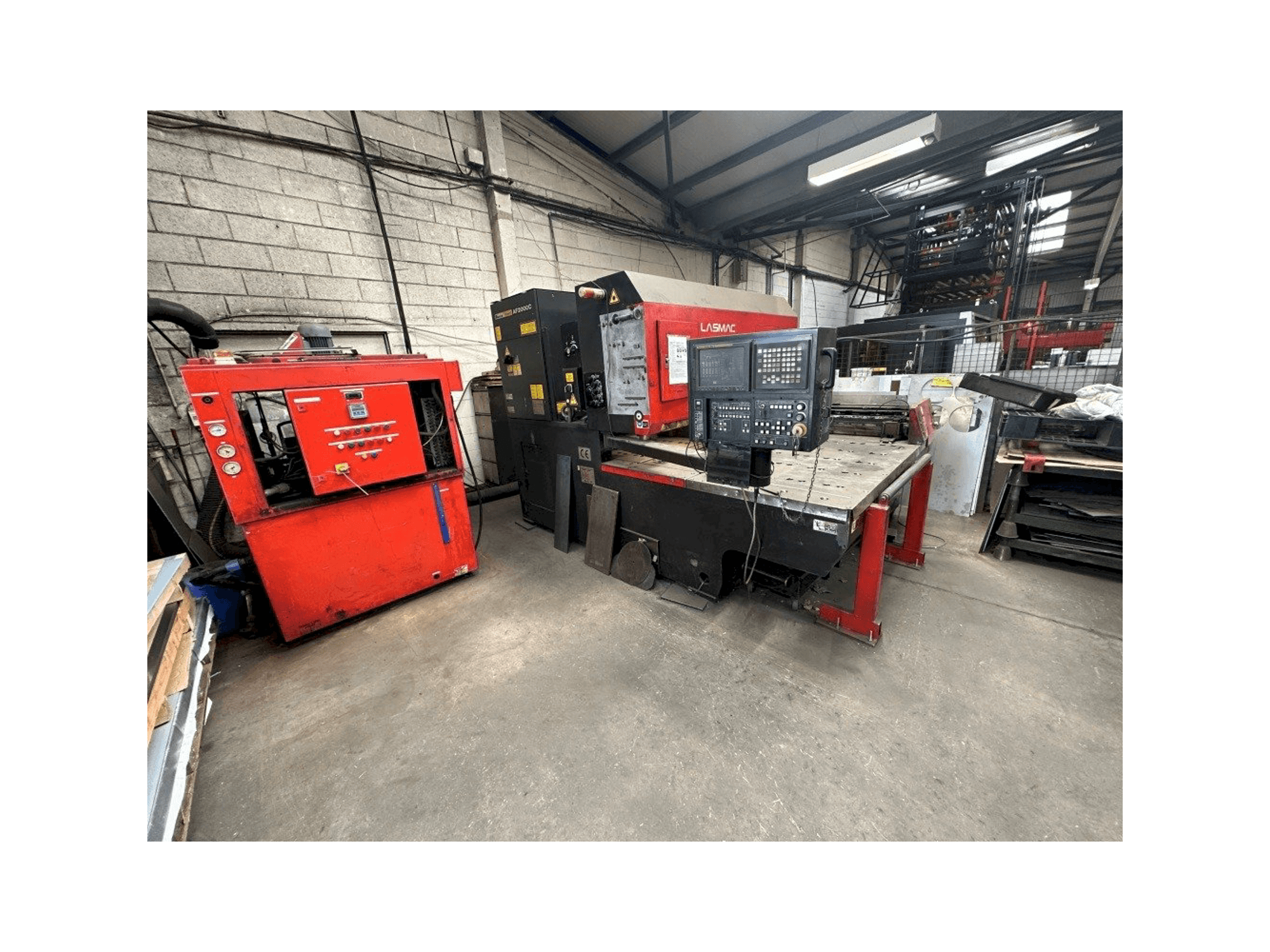 Vue de face de la machine AMADA Lasmac LC1212A3