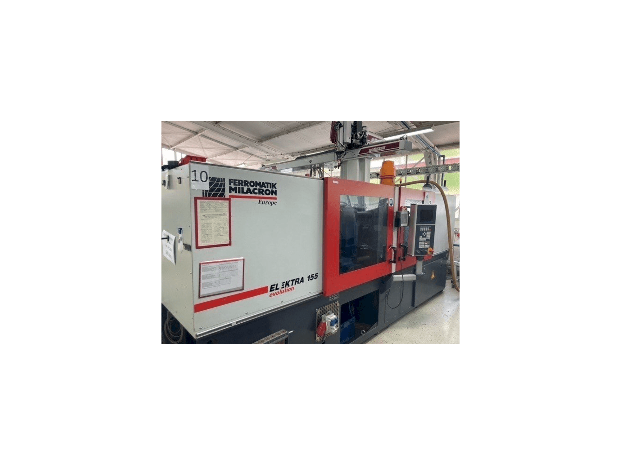 Vue de face de la machine FERROMATIK MILACRON EE 155