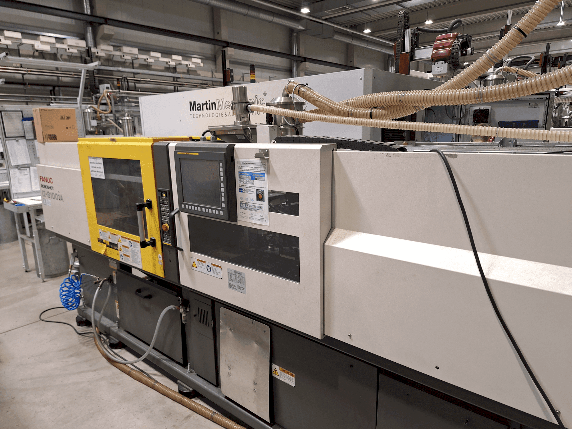 Vue de face de la machine FANUC Roboshot S100iA