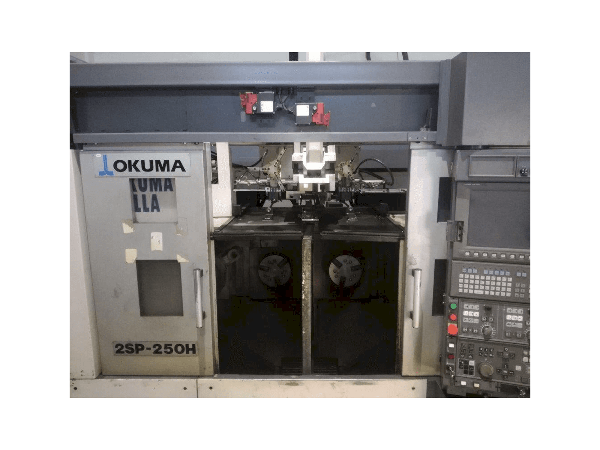 Front view of Okuma 2SP-250H machine