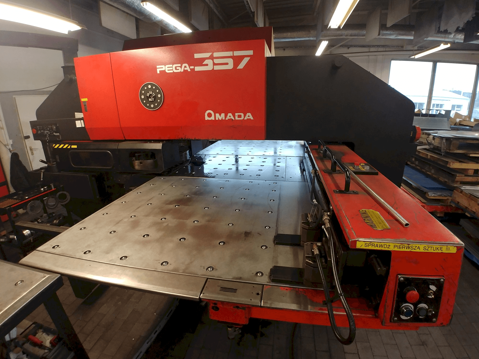 Right side view of AMADA PEGA 357 Machine