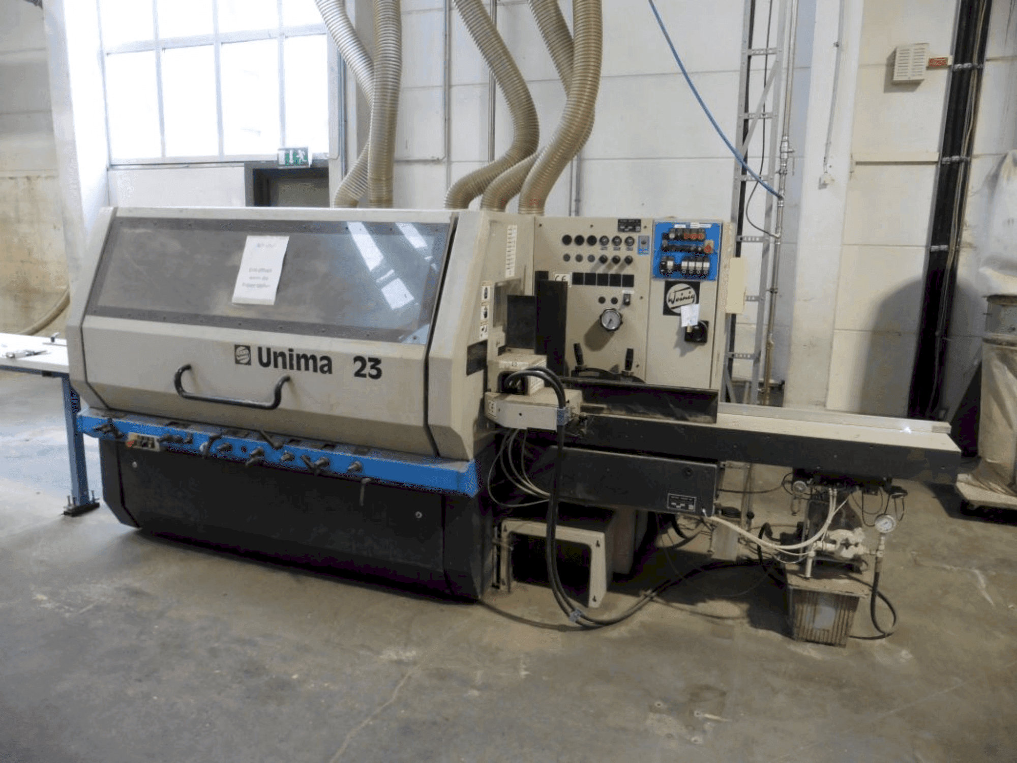 Vue de face de la machine WEINIG / DIMTER Unimat 23 E