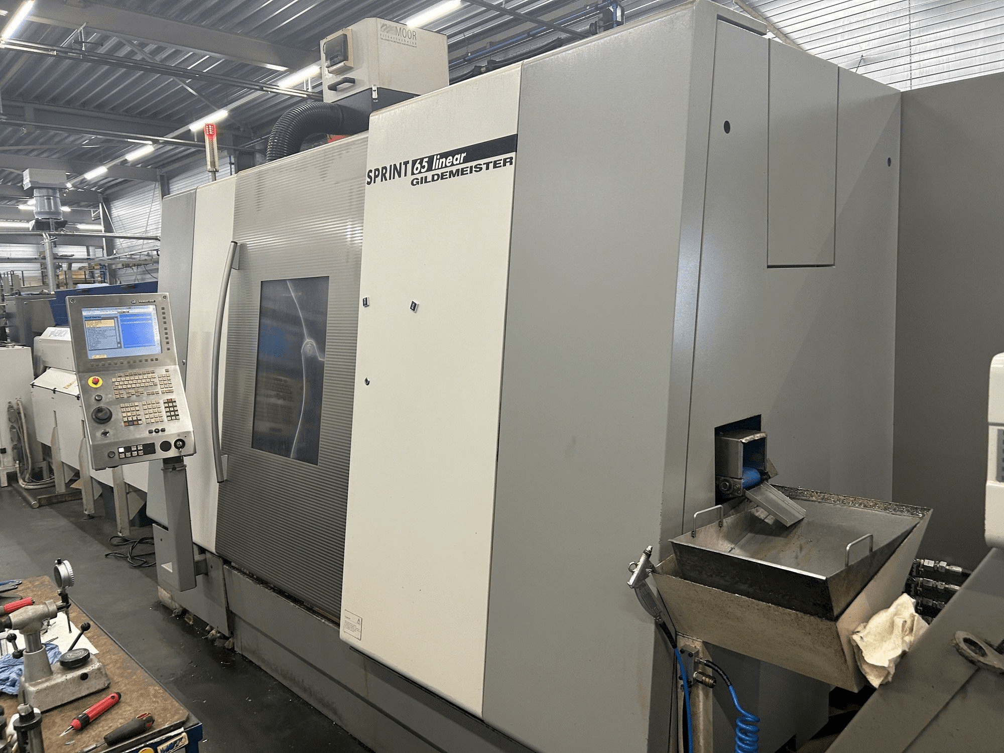 Vue de face de la machine Gildemeister Sprint 65 linear
