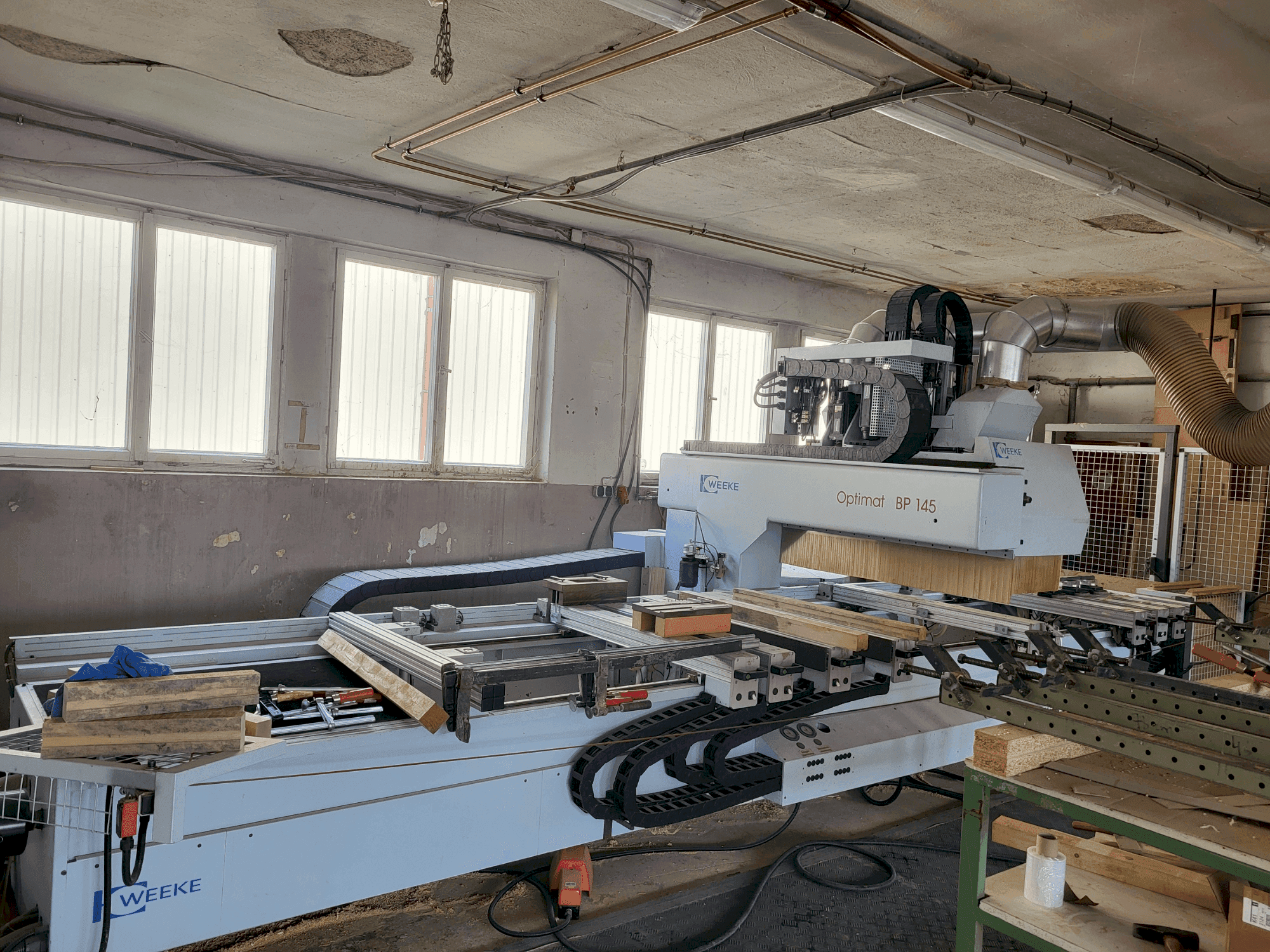 Vue de face de la machine Weeke Optimat BP145