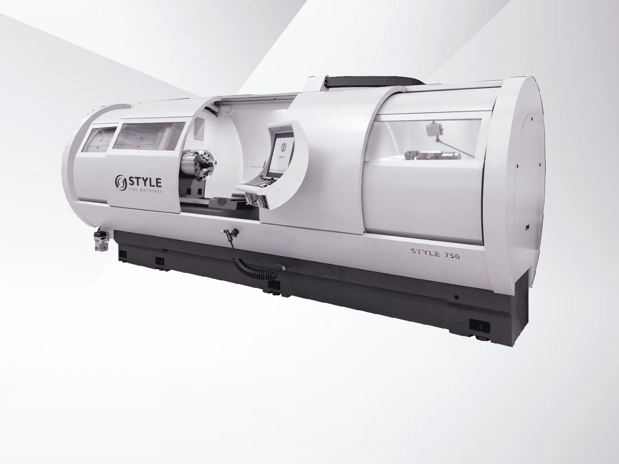 Tour CNC STYLE 750, vue de face, doté d'une grande fenêtre, d'un panneau de commande et d'une mécanique de précision pour un usinage avancé.