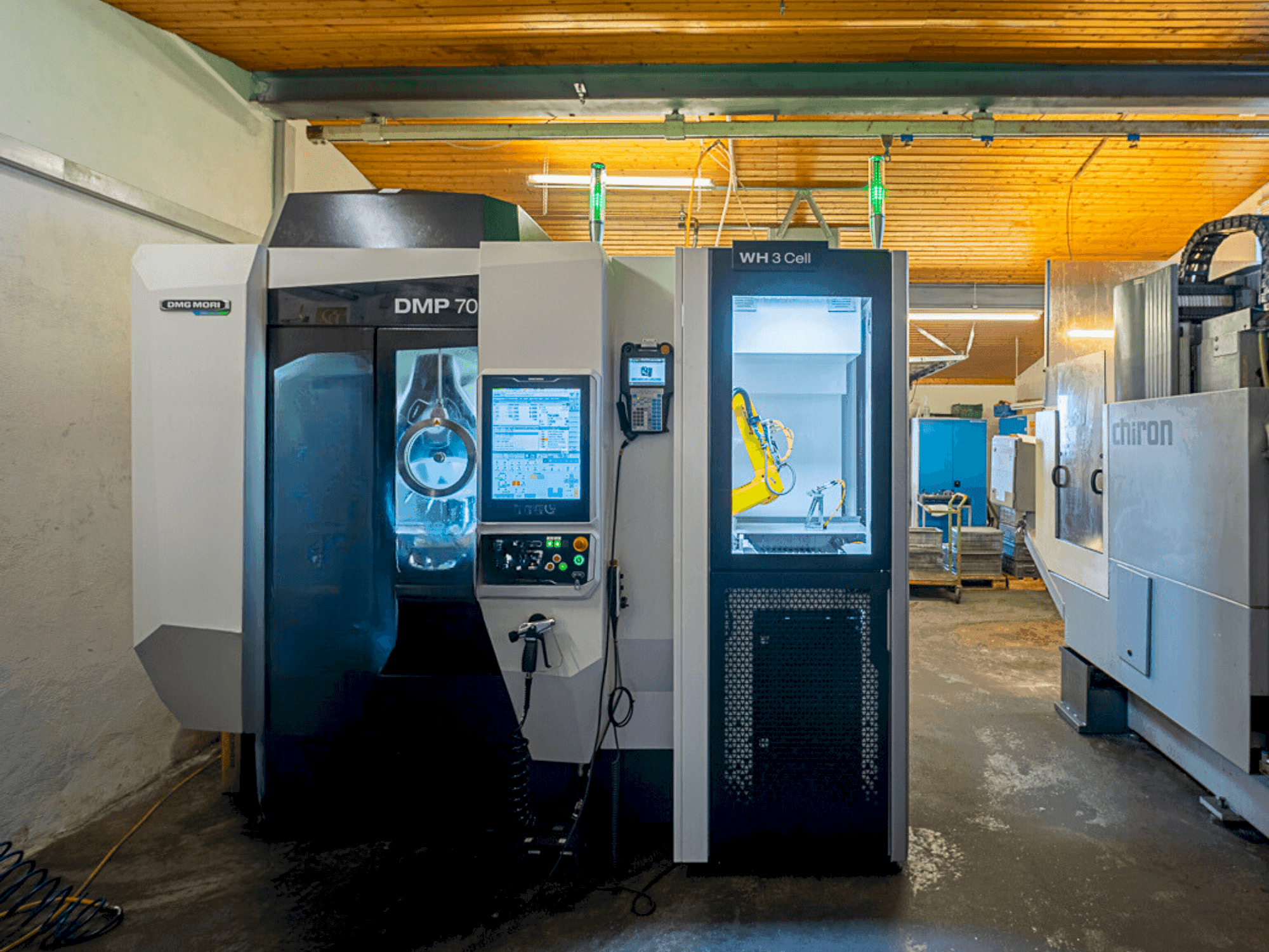 Vue de face de la machine DMG MORI DMP 70 with WH3