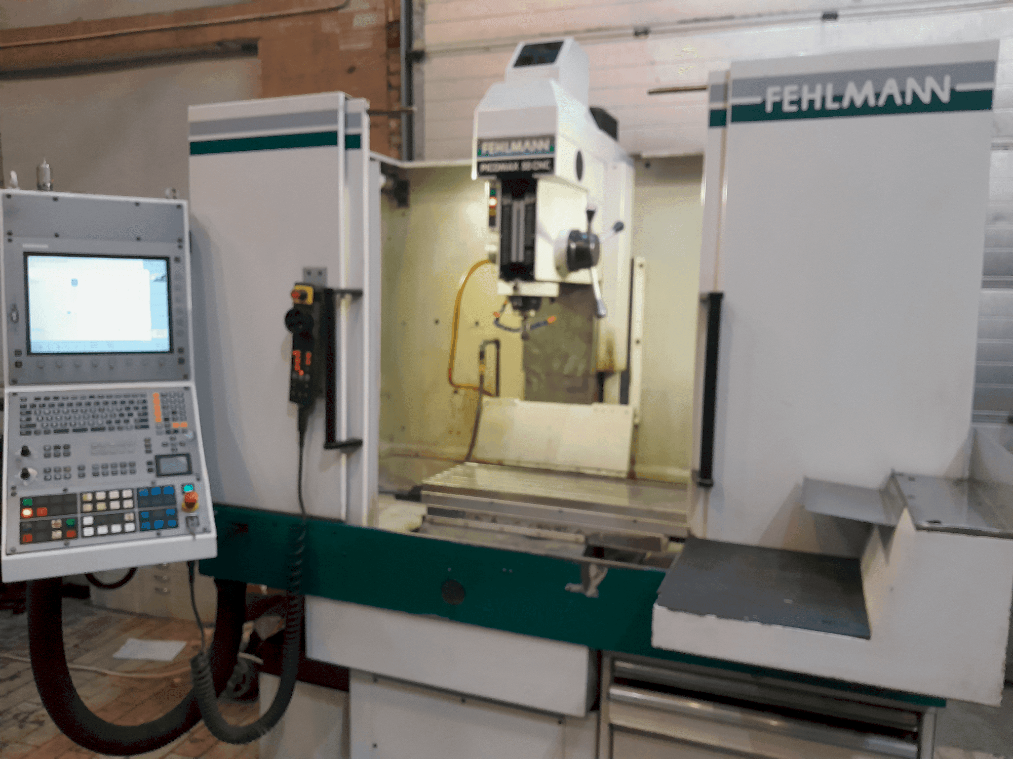 Vue de face de la machine FEHLMANN PICOMAX 55 CNC 2/3