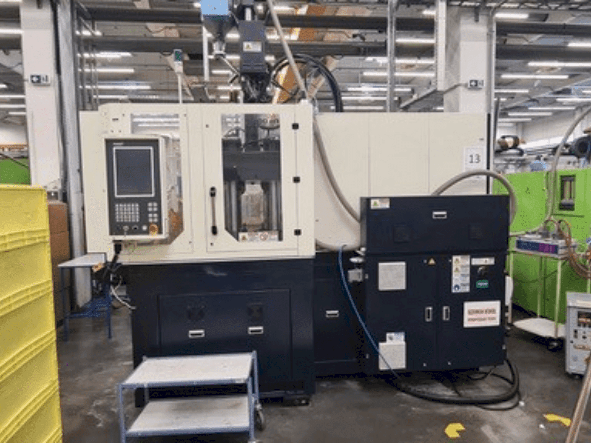 Vue de face de la machine WOOJIN VHA120RS