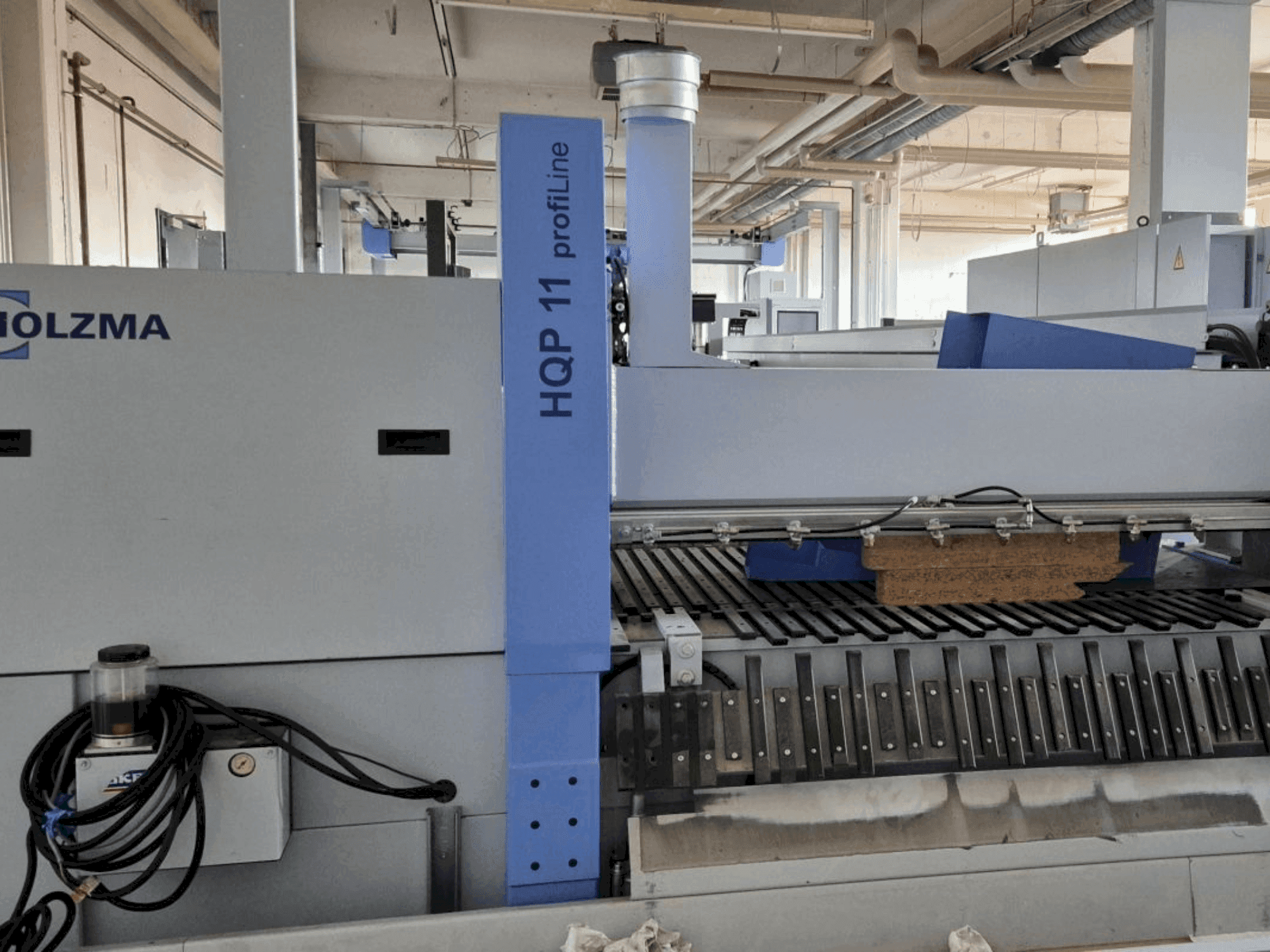 Vue de face de la machine HOLZMA PROFI HQP 11/16/56/L/X