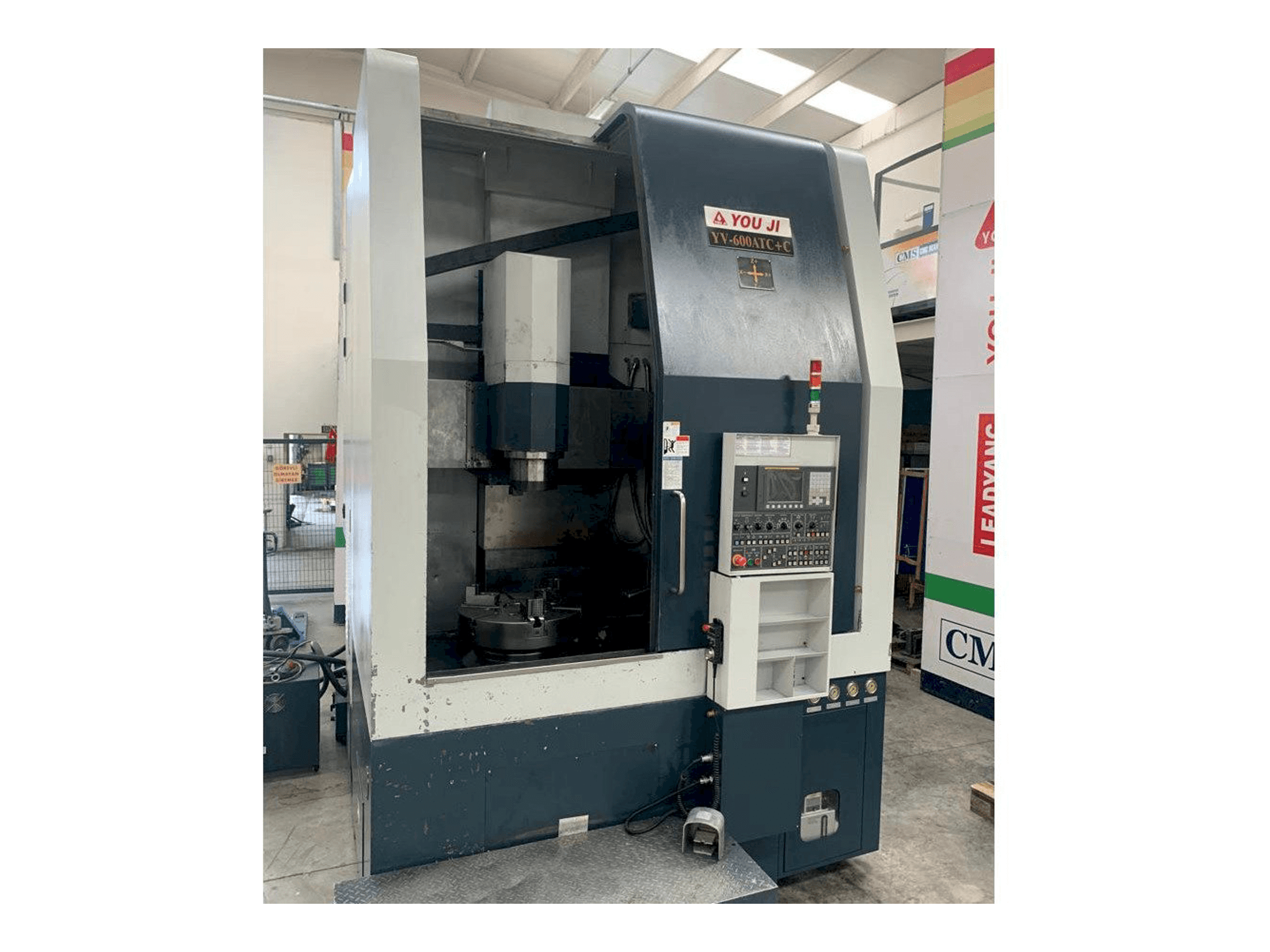 Front view of YOU JI Yv 600ATC+C machine