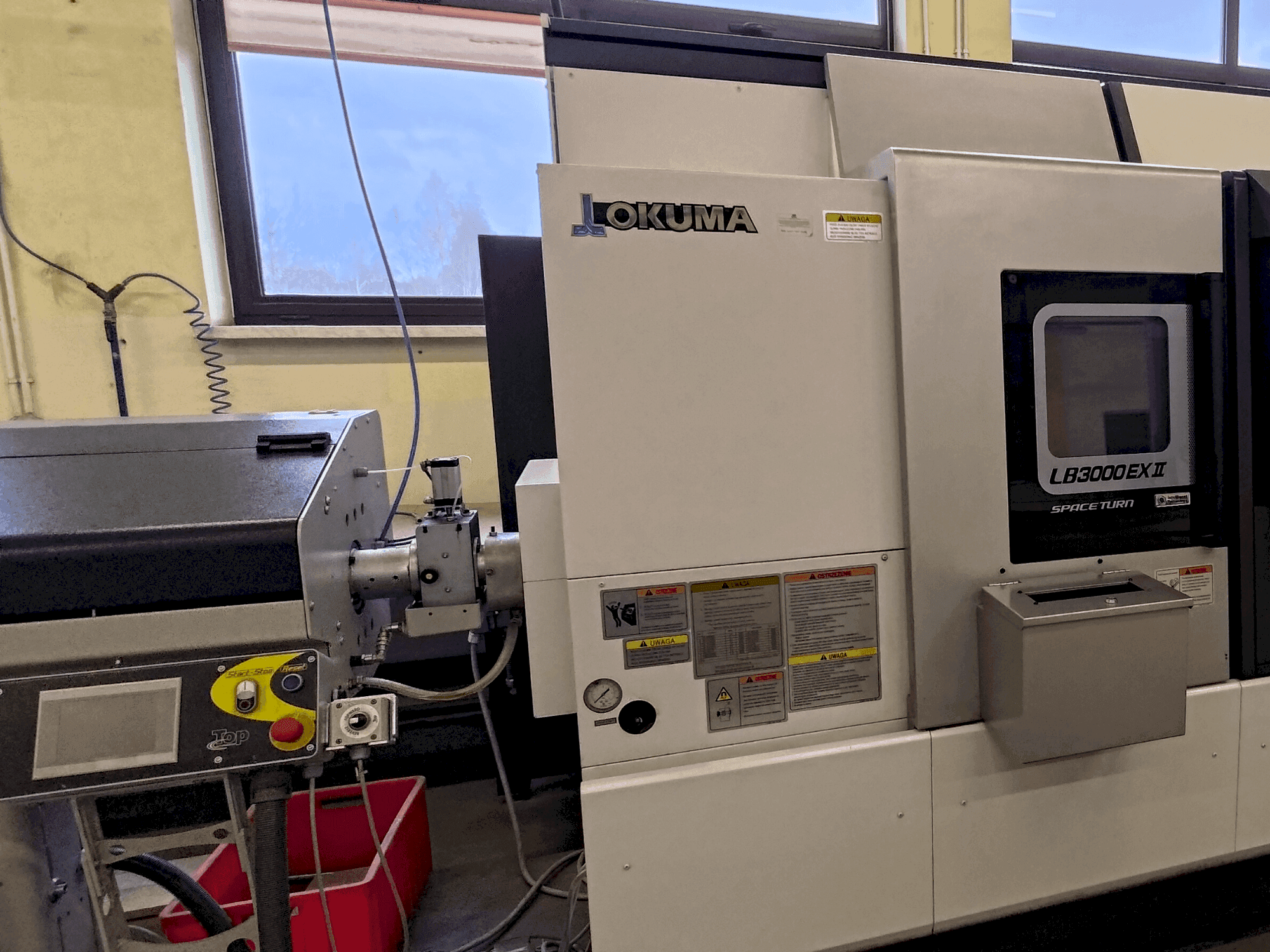 Vue de face de la machine Okuma LB 3000 EXII MYW 450