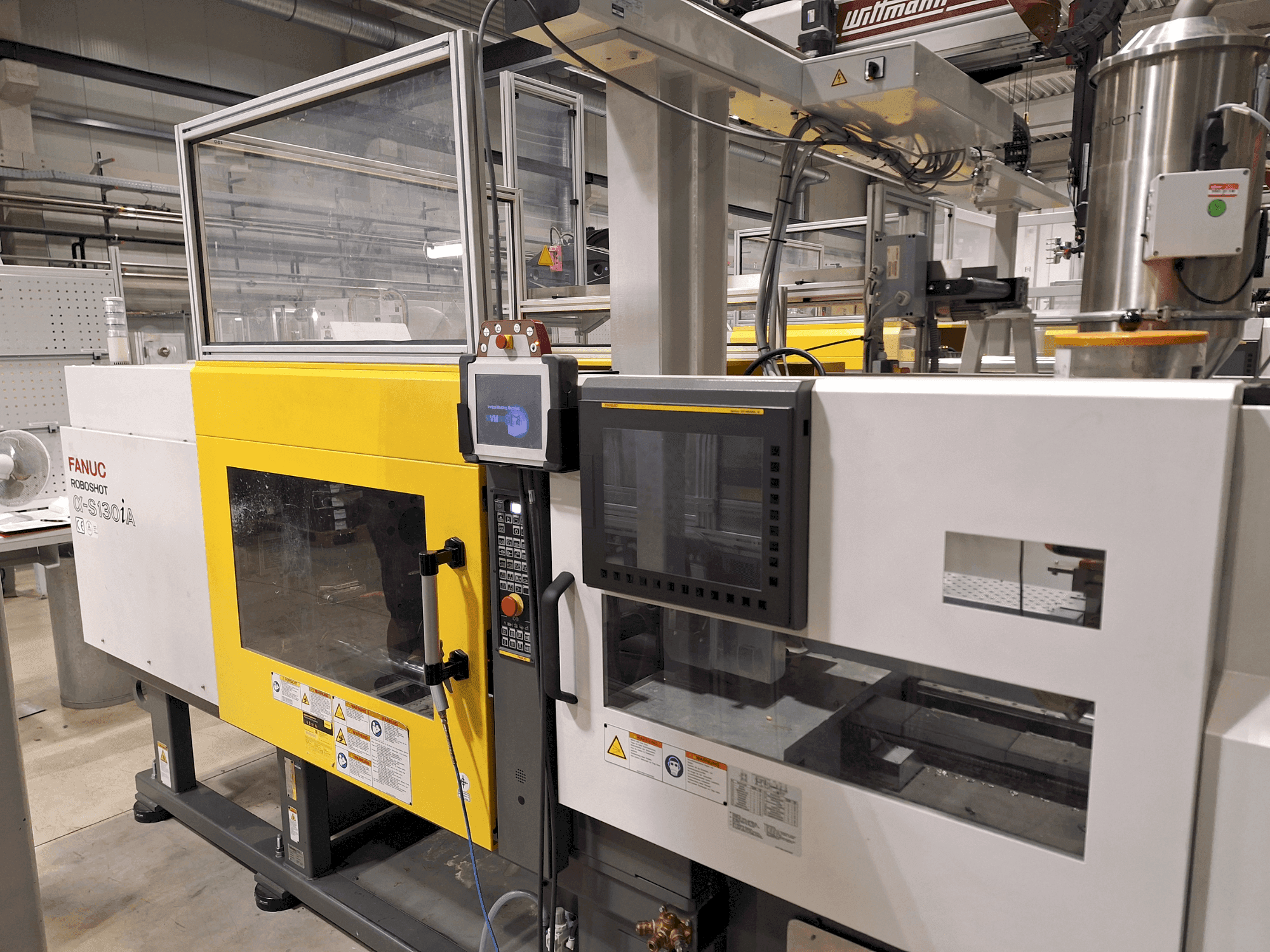 Vue de face de la machine FANUC Roboshot S130iA