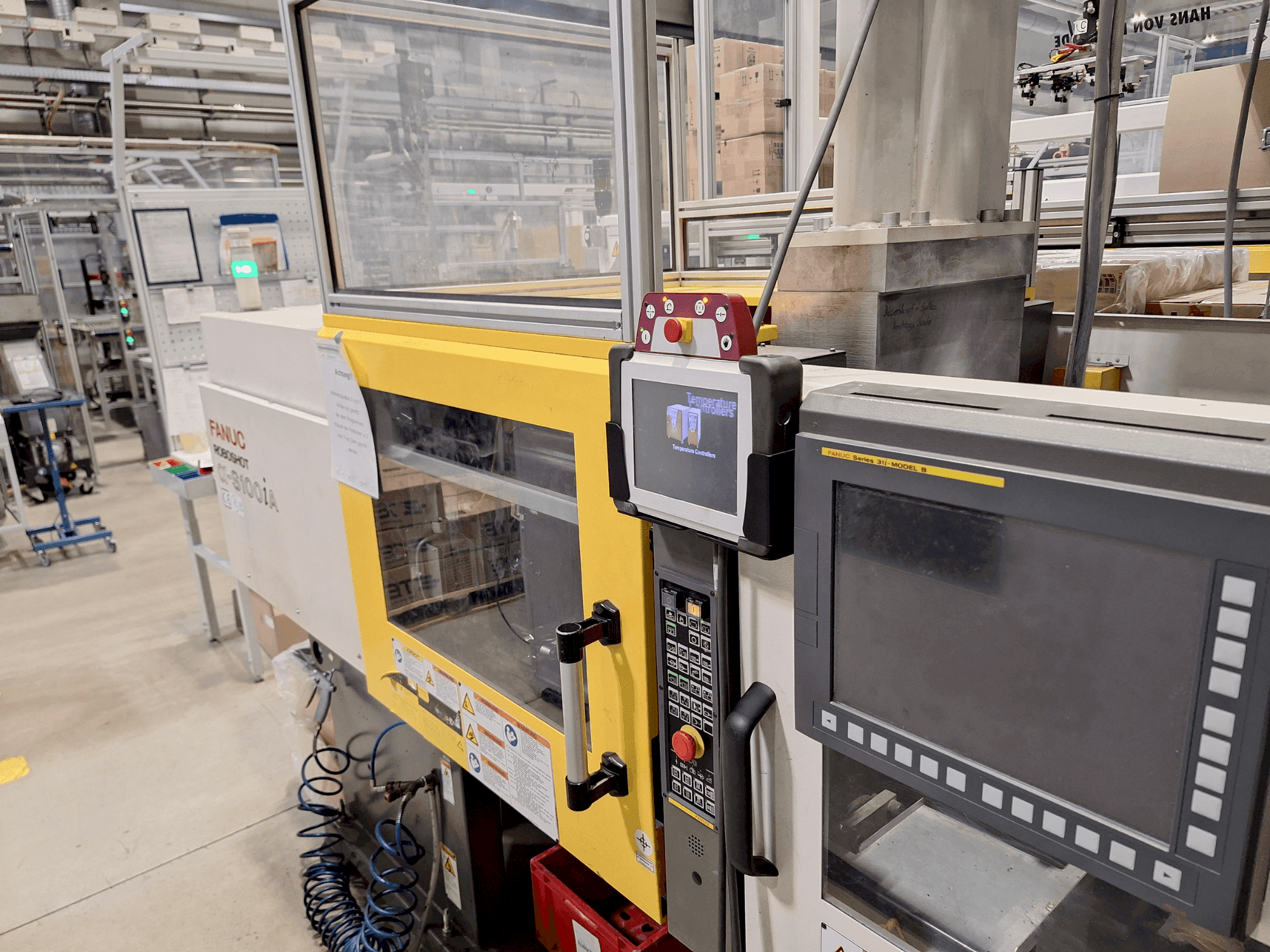Vue de face de la machine FANUC Roboshot S100iA