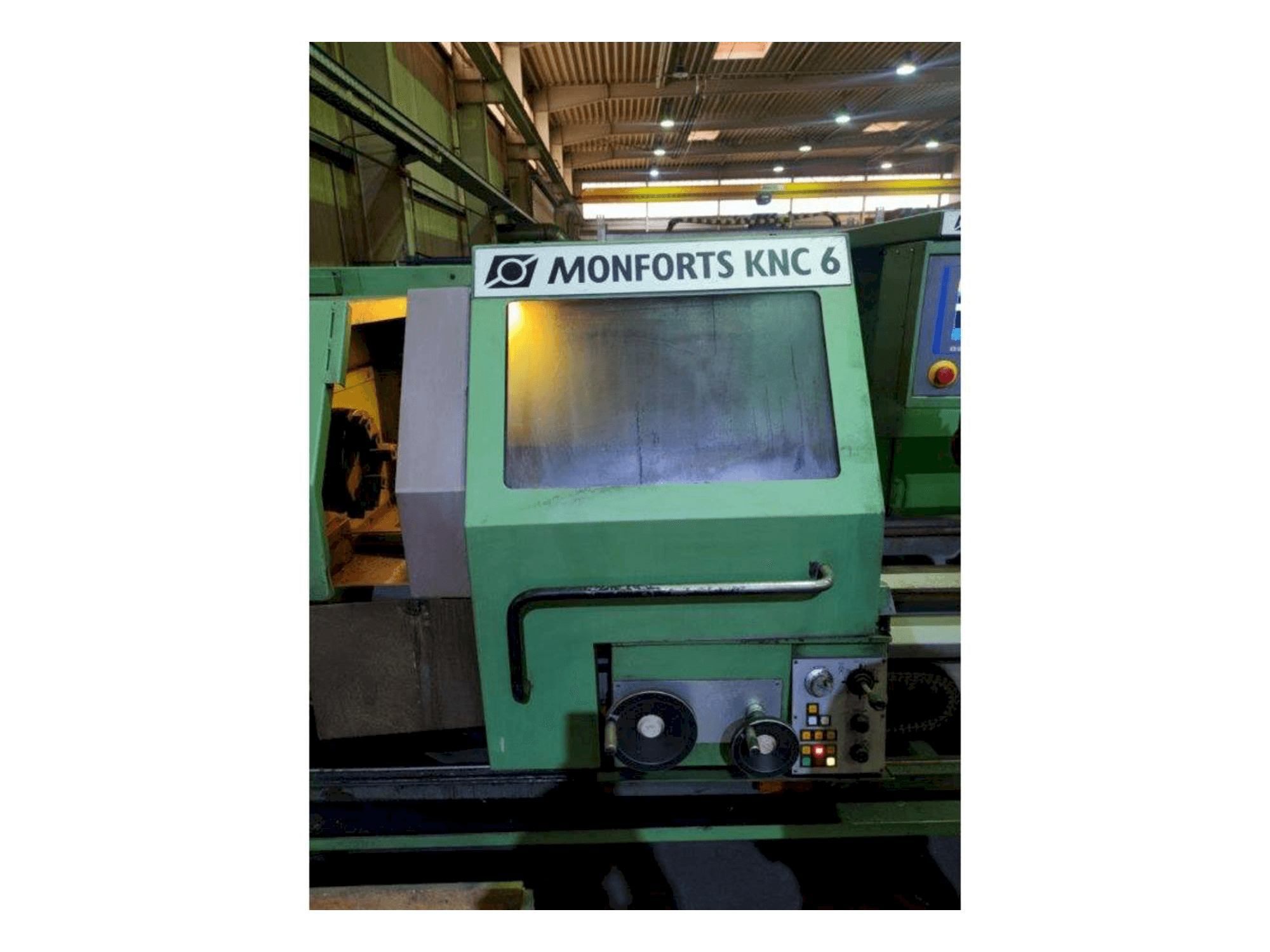Vue de face de la machine Monforts KNC6 x 2000