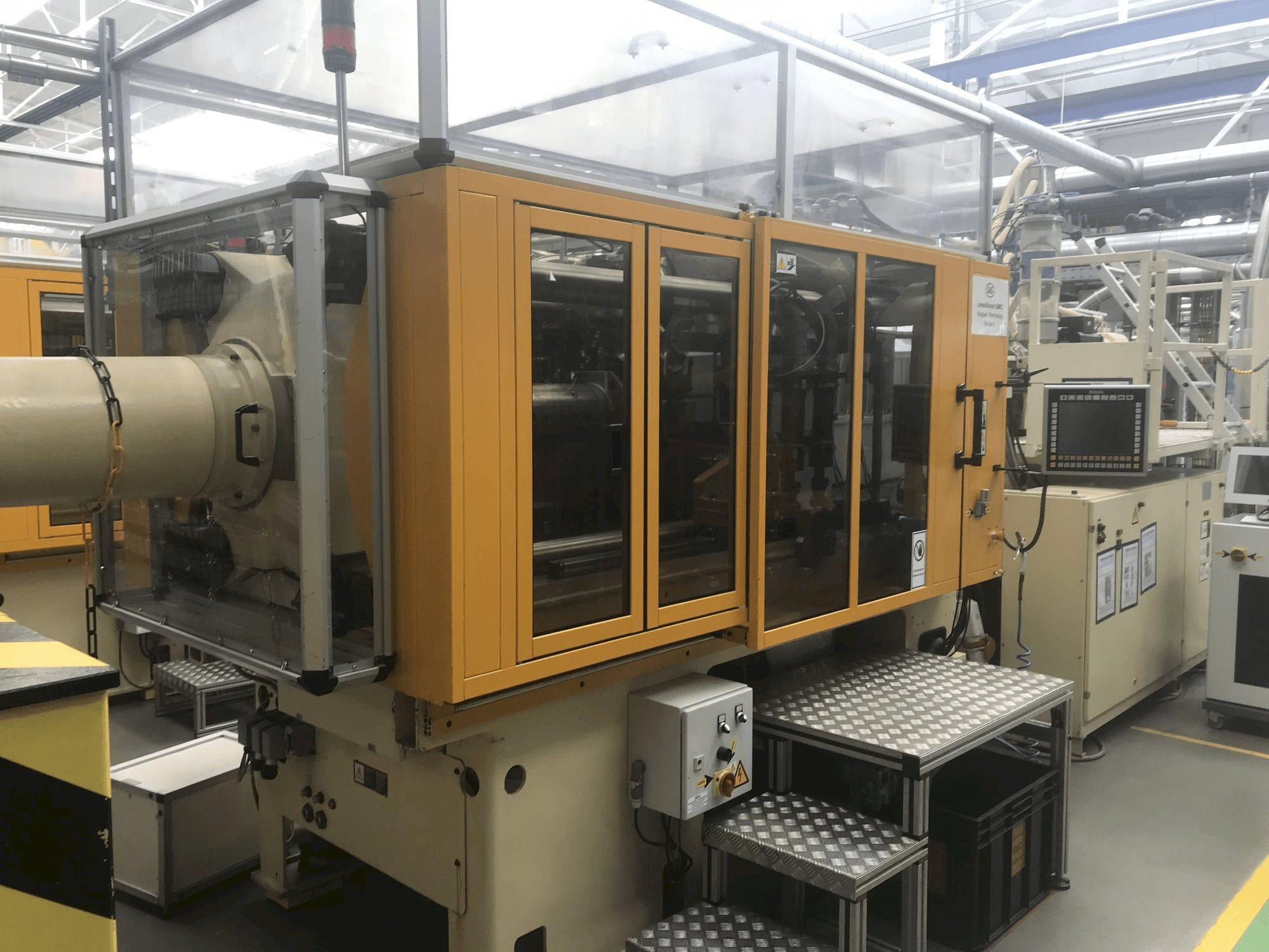 Vue de face de la machine Husky H225 RS 55/50