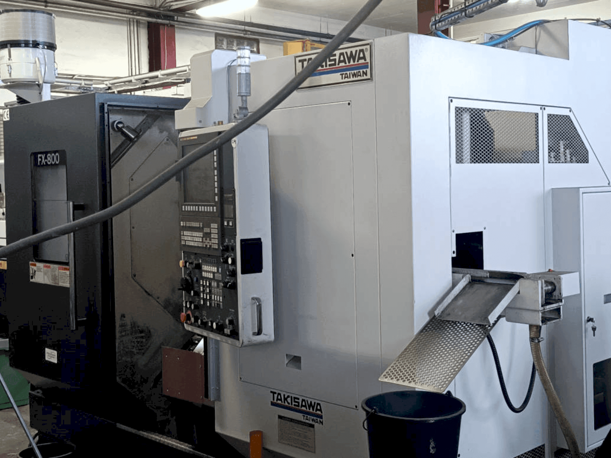 Vue de face de la machine Takisawa FX800