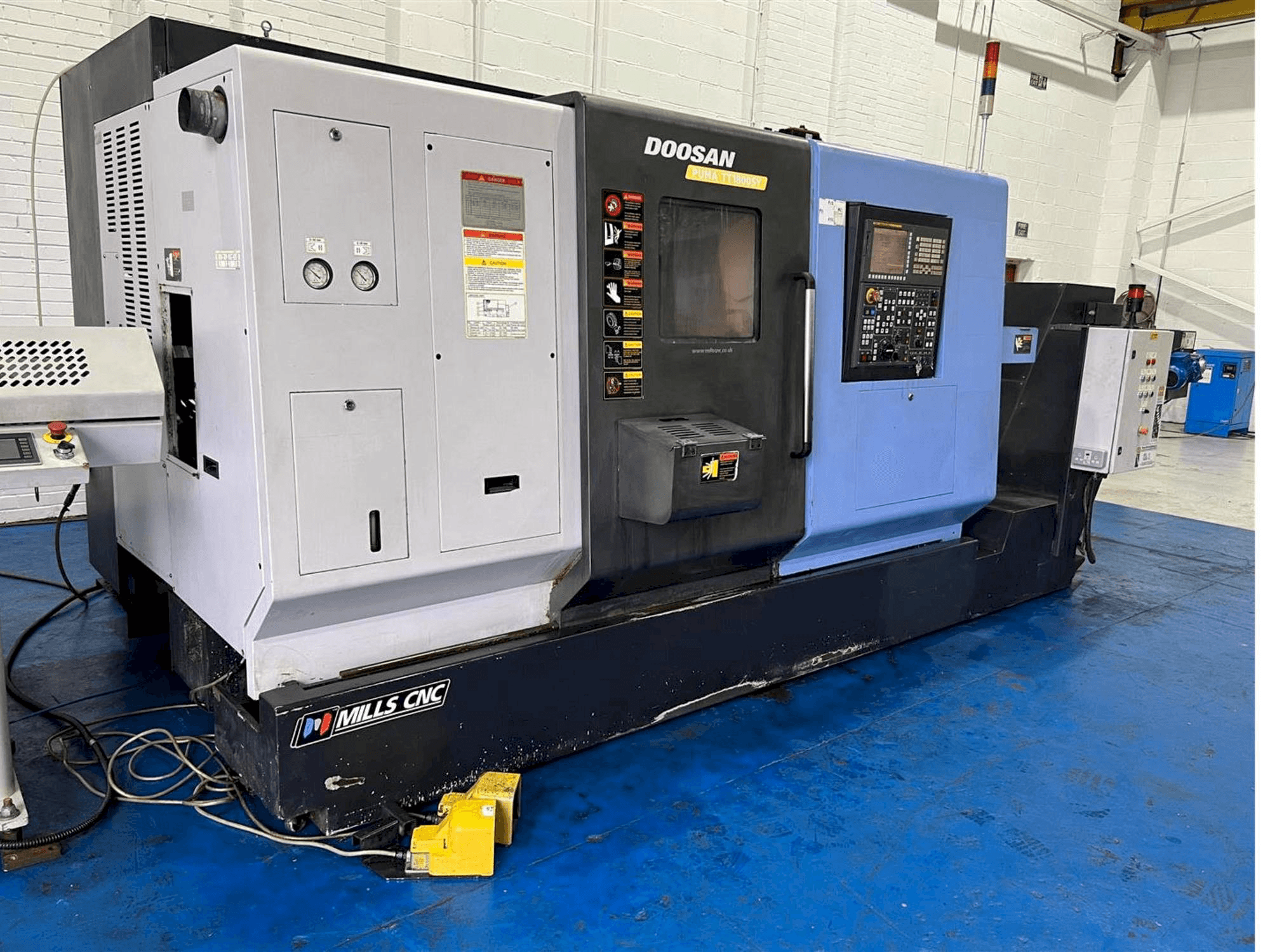 Front view of Doosan TT1800SY machine